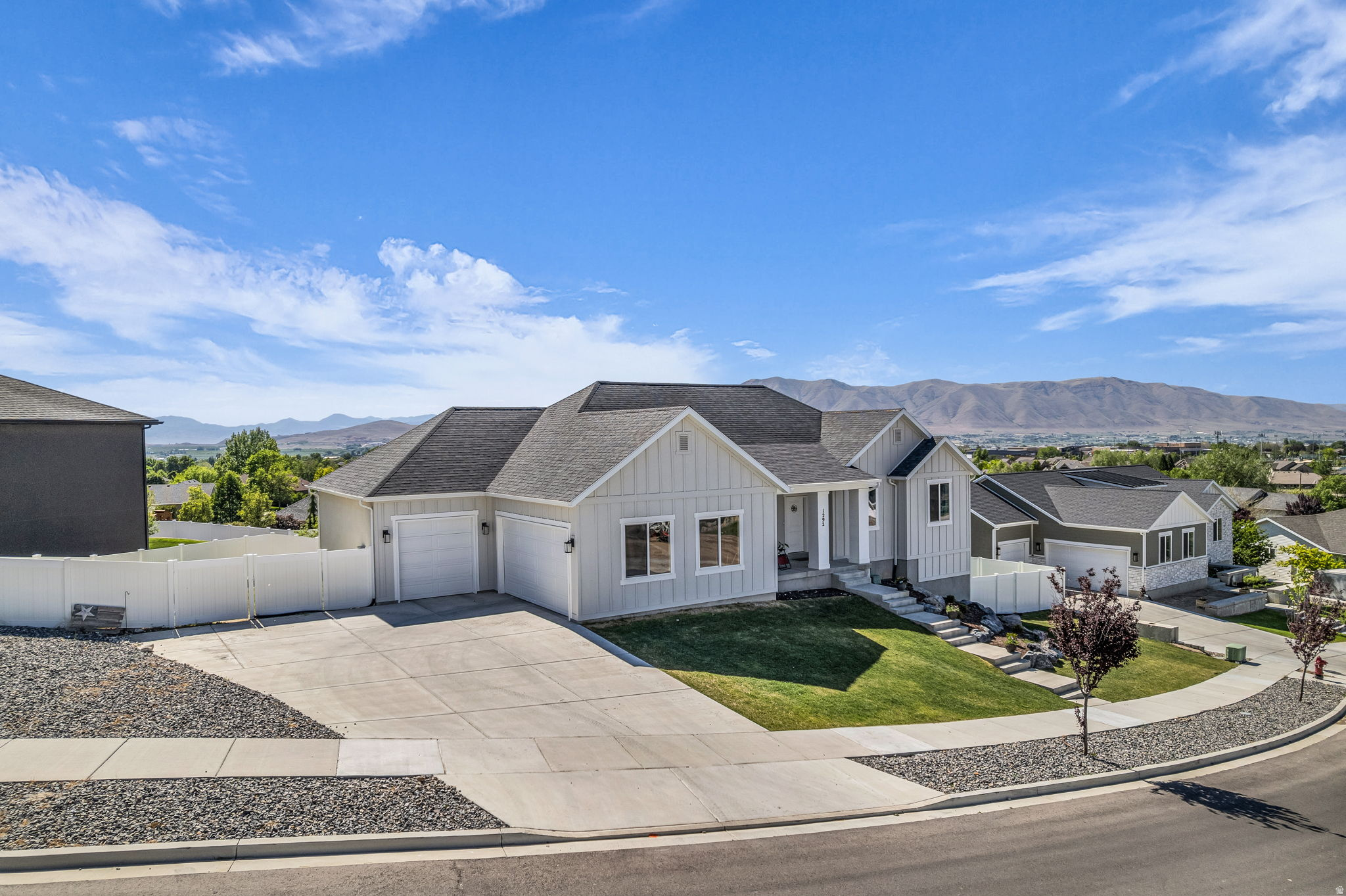 Beautifully maintained 3-year-old rambler located in the highly sought-after Payson View Estates community. Enjoy breathtaking panoramic views of both the valley and surrounding mountains right from your home. This property features numerous upgrades throughout, including high-quality laminate flooring, quartz countertops, and craftsman-style, ceiling-height cabinetry, creating a modern yet warm and inviting feel.  Skip the hassle and added expense of new construction with a fully landscaped yard and complete fencing already in place. All appliances are included in the purchase and washer/ dryer are negotiable! The daylight basement provides abundant natural light and offers endless possibilities for additional living space, a rental opportunity, or a custom finish to suit your needs.  This home combines comfort, quality, and convenience, schedule your showing today!