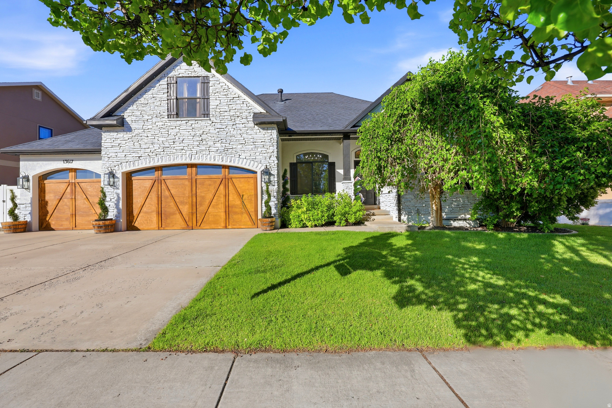This Outstanding Fully Finished Rambler with Bonus Loft above Garage is Stunning Inside & Out.  Exterior has been updated and beautiful curb appeal. Geourgous Wood Flooring flows from the Grand Entry with Formal Living Room, Impressive Vaulted Ceilings in the Sprawling Family room, Fireplace with Custom Built ins.  A Chef's Kitchen sure to be the hub of the home. Custom Cabinets, Central Island, Professional Grade Stainless Appliances, Farmhouse Kitchen Sink with top of the line fixtures. Main Level Primary Bedroom with Spa like Attached En Suite Bathroom and Walk in Closet. 2 Additional Main level Bedrooms, Hall Bathroom and Laundry.  Great Loft Space above the Garage perfect for additional Bedroom or Family Room.  Basement is fully finished with Dedicated Outdoor Entrance,  Gym Room, Large Family Room/Rec Space, Bedroom and Bathroom.  Fully Fenced Back Yard, Paver Patio, RV Parking along side of Garage.   Square footage figures are provided as a courtesy estimate only.  Buyer is advised to obtain an independent measurement.