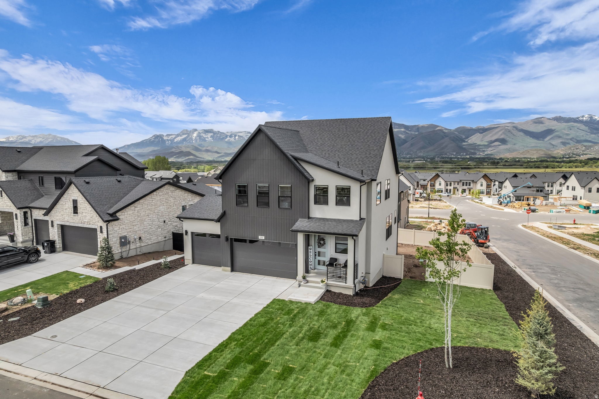 Welcome to 1797 N. 390 E. in Heber City's Coyote Ridge-one of the valley's most exciting and fast-growing communities. Completed in December 2025, this 5-bedroom, 3.5-bath home offers nearly 2,900 sq ft of thoughtfully designed living space on a premium corner lot, bringing in added light, privacy, and a more open feel from the moment you arrive. New landscaping creates a clean, finished look and an inviting outdoor space ready to enjoy, complete with an extended concrete patio-perfect for entertaining or relaxing in your private hot tub. Inside, the layout is both functional and flexible, featuring two primary suites-ideal for multi-generational living, hosting guests, or simply having room to spread out. The main living areas flow effortlessly, enhanced by a granite island countertop, GE appliances, and clean, modern finishes that make everyday living feel elevated yet comfortable. Additional upgrades like metal railing details and thoughtful touches throughout add both style and durability. Upstairs is where this home truly stands out. The primary suite is positioned to capture some of the best views of Mount Timpanogos in the area-a daily backdrop that brings a sense of calm and connection to the outdoors. Designed with comfort and efficiency in mind, the home also includes a water softener and filtration system, plus an on-demand water heater for modern convenience. A 3-car garage and close proximity to Coyote Springs Park enhance the lifestyle appeal, while the surrounding Heber Valley offers year-round recreation and convenience. Clean, new, upgraded, and perfectly positioned-this is the kind of home that just feels right the moment you walk in. Furniture is optional.