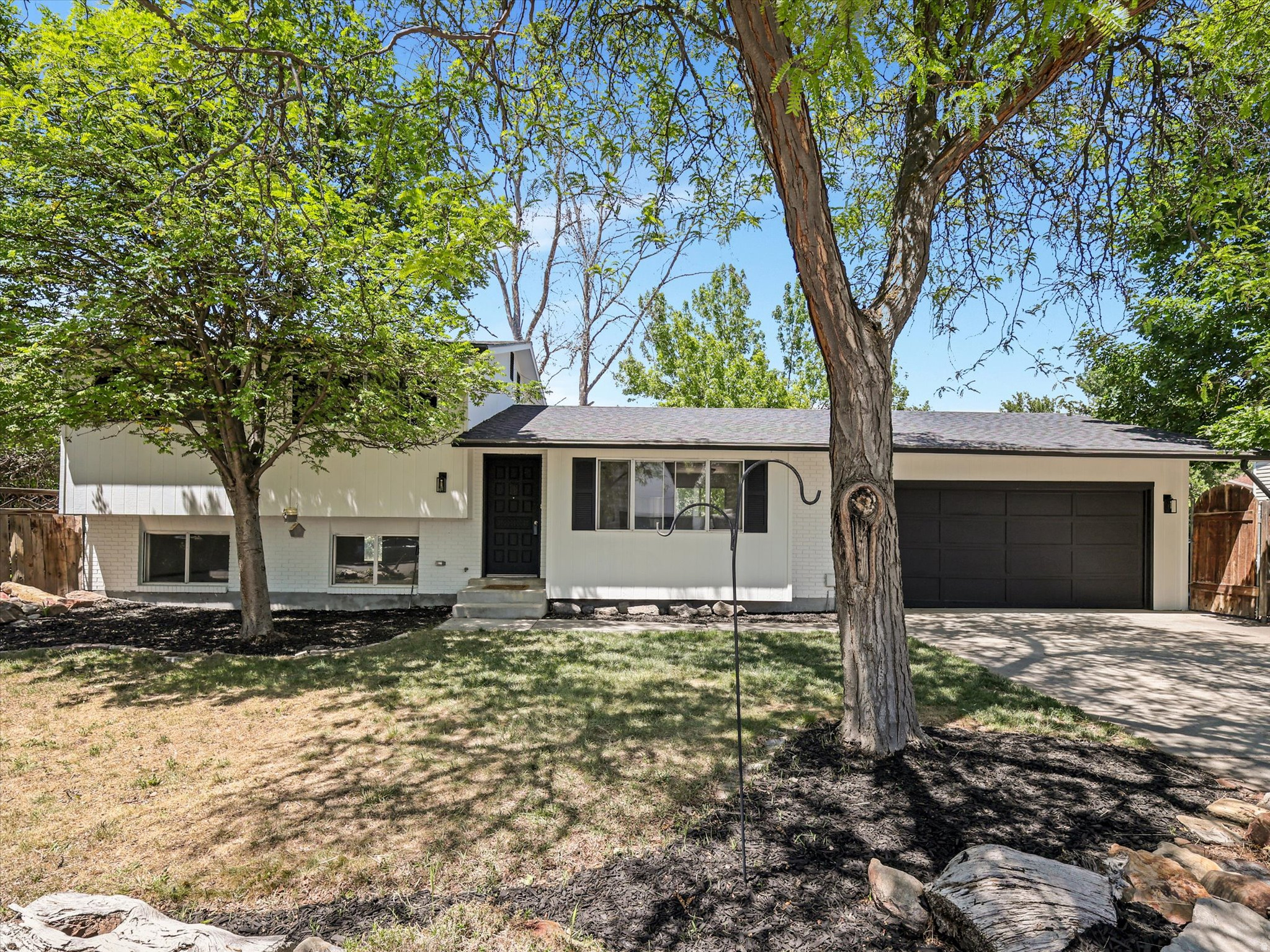 This updated 4-bedroom, 2 bathroom home delivers the clean, modern finishes today's buyers are looking for without the wait for new construction, complete with a newer roof, water heater, and HVAC unit. From the moment you walk in, you'll notice the thoughtful updates throughout that make this home truly move-in ready. The flexible layout is one of the standout features - the basement bedroom offers the perfect setup for rental income, or a private guest space, giving you options most homes simply don't provide. Step outside to a generously sized backyard with endless potential. Whether you're envisioning a garden, outdoor entertaining area, play space, or all of the above, this canvas is ready for your ideas. The garage rounds out the package with extra storage space to keep everything organized and out of the way. Location is everything, and this home delivers. Situated just minutes from UVU, I-15, and an abundance of dining and shopping options, commuting and everyday errands have never been easier. Whether you're an owner-occupant looking to offset your mortgage or an investor seeking a smart addition to your portfolio - this one checks all the boxes. Don't miss it!