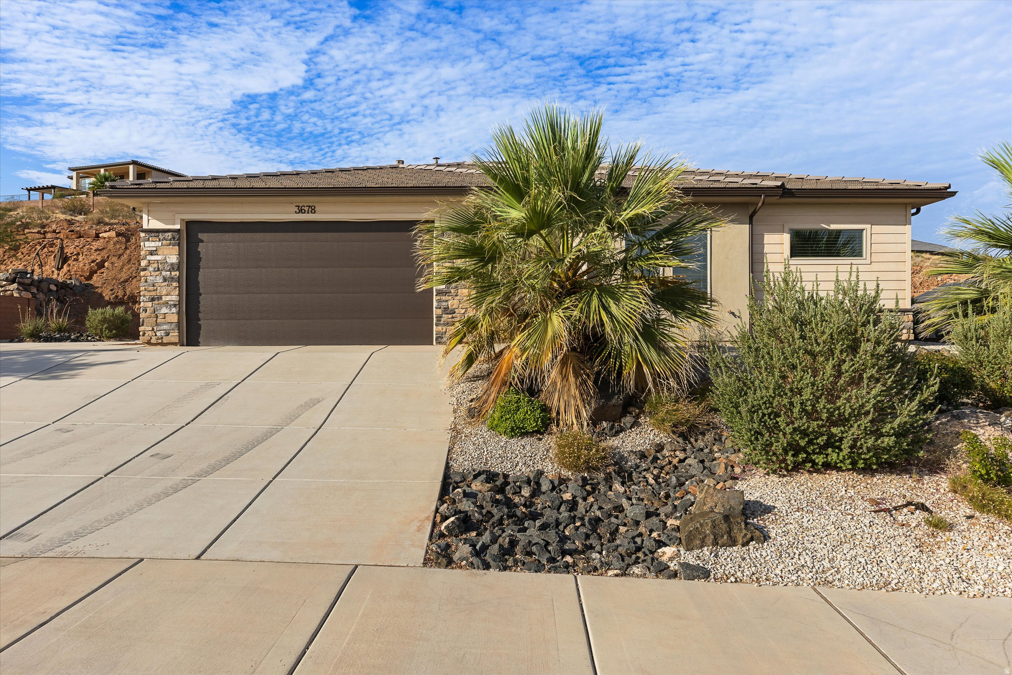 Priced to sell in the growing Desert Canyons community! Enjoy the perfect balance of convenience and tranquility-close to shopping, dining, and everyday amenities while tucked away from heavy traffic and congestion.  This versatile home offers comfortable living space with a built-in office, ideal for working from home.  Situated on a spacious lot, the property provides plenty of room behind the home for outdoor enjoyment, gardening, recreation, or future customization. Low-maintenance xeriscape landscaping helps conserve water while enhancing curb appeal and reducing upkeep.  Whether you're looking for a primary residence, investment opportunity, or a home with flexible living options, this Desert Canyons property delivers value, space, and potential in one of the area's most desirable up-and-coming neighborhoods.