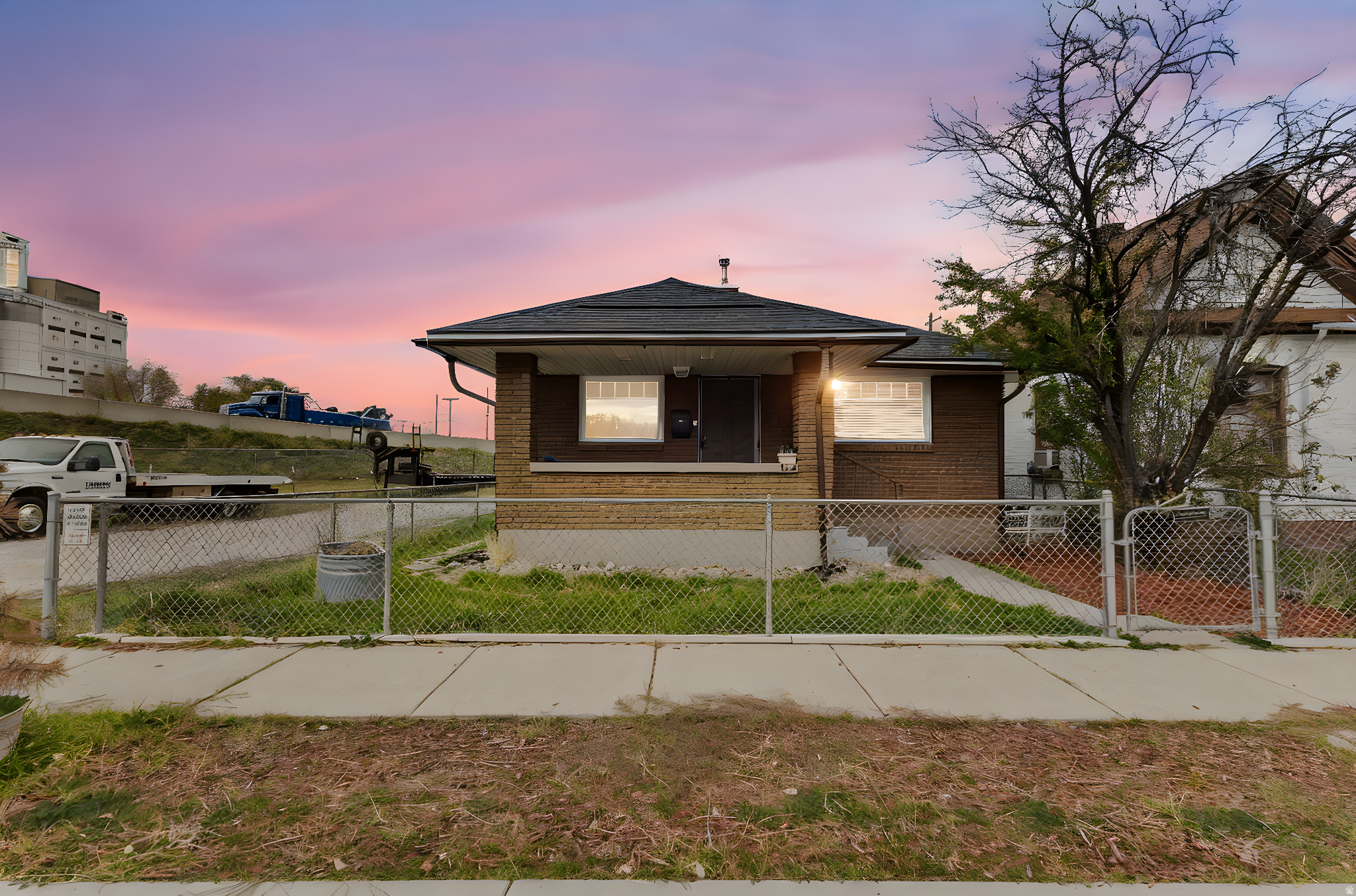 SELLER FINANCING AVAIALBLE w/ $20,000 DOWN!! Welcome to this incredibly Clean & Updated 3-bedroom Starter Home in Downtown Ogden sitting on a generous piece of Land! Zoned C2 and can be Residential or Commercial.  This well maintained all Brick Bungalow with great Curb Appeal has a Brand-New Roof & PAID OFF Solar Panels, so your electric bill is virtually nothing! With new HVAC including a Lennox Furnace, Goodman AC, Condenser, Water Heater, plus LVP Flooring, Kitchen Cabinets, Tiled Backsplash, Black Appliances including a Gas Stove & a French Door Refrigerator, Paint, Bathroom, Vinyl Windows, & Maintenance Free Landscaping, this Gem has no Backyard or Westside Neighbors. Tons of RV Parking for Trailers & Extra Cars & plenty of storage in the Basement. Let's not forget about the Large Backyard for Endless of possibilities!