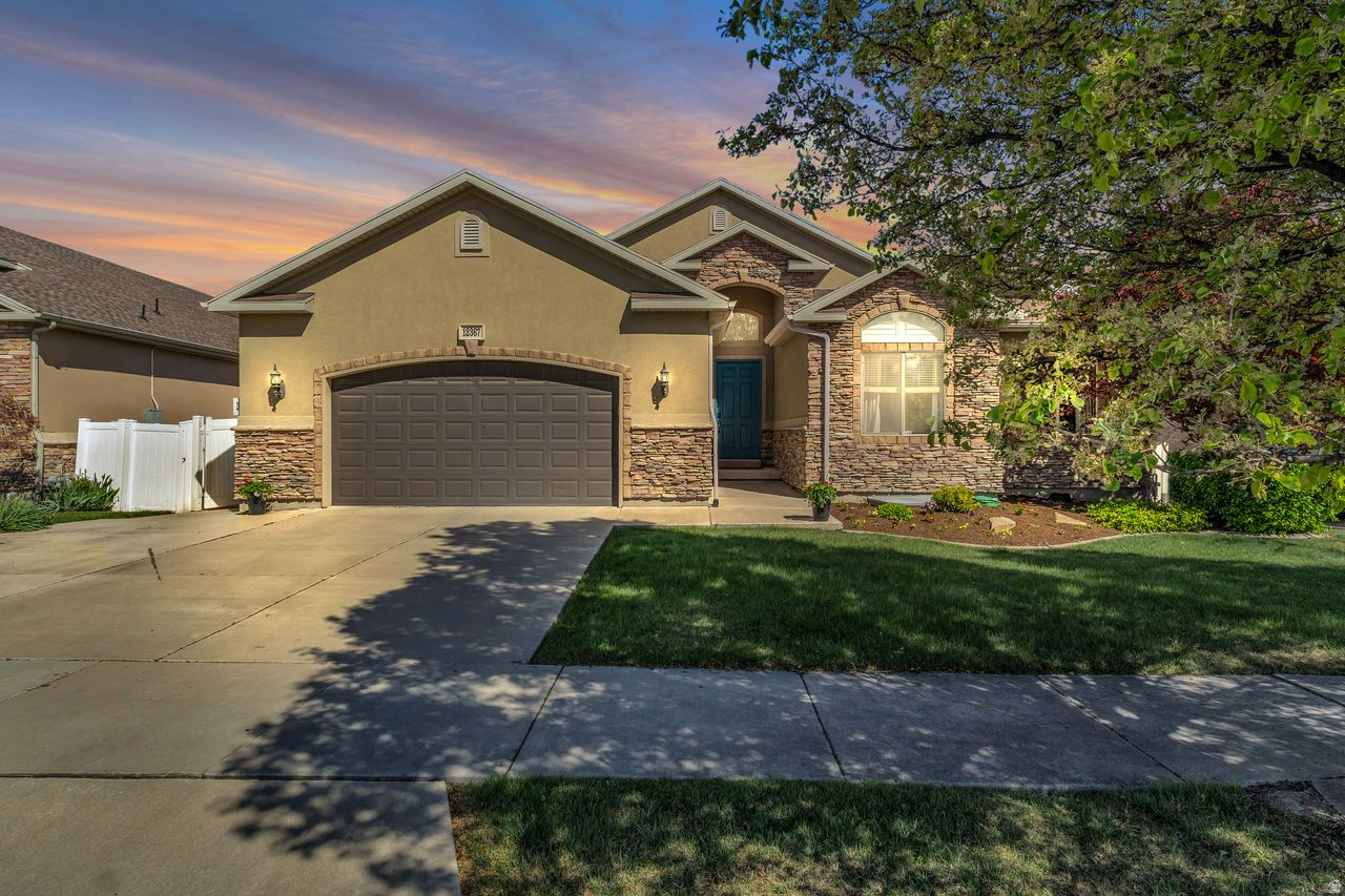 From the moment you step inside, this home makes a statement! The entry draws your eye straight through the front room to breathtaking, unobstructed views of the Wasatch Mountains, with no backdoor neighbors to interrupt the scenery.   The main level is both beautiful and functional, featuring continuous wood plank tile flooring and an open floor plan with vaulted ceilings that create light, flow, and space.   Additional highlights include:   Main floor laundry for everyday ease   Covered deck to take in the views year-round   Well-designed backyard with greenspace, patio, in-ground trampoline and vinyl fencing  The daylight basement is a standout feature, complete with a kitchen, office with above-ground windows, and the ideal setup for a potential interior ADU or multi-generational living.   Upstairs, two connected bedrooms offer a creative sleeping and play space, while the primary suite features an euro-style open smart shower that feels like a private retreat.   This home blends views, versatility, and thoughtful design in a way that's hard to find.