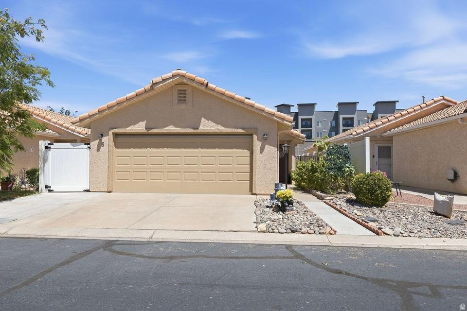 Welcome to this charming, immaculate, and move-in-ready 2-bedroom, 2-bath, 2-car garage home located in the beautifully maintained, premier 55+ Ridgepointe community. Featuring numerous updates throughout, this well-cared-for home offers comfortable living with an inviting floor plan and plenty of space to relax and entertain. Step outside and enjoy your own fully enclosed private backyard with an inviting established garden, the perfect place to unwind or enjoy Southern Utah's beautiful weather. With a low HOA fee of just $108 per month, residents enjoy exceptional amenities including an indoor swimming pool, hot tub, clubhouse, fitness center, and private roads. Conveniently located near shopping, dining, hiking and biking trails, freeway access, and everyday conveniences, this home offers the ideal combination of comfort, value, and lifestyle. Don't miss this opportunity, this is a must-see! Buyer to verify all information, deemed reliable, however buyer to verify all info including utilities, rental restrictions, and HOA information if applicable.