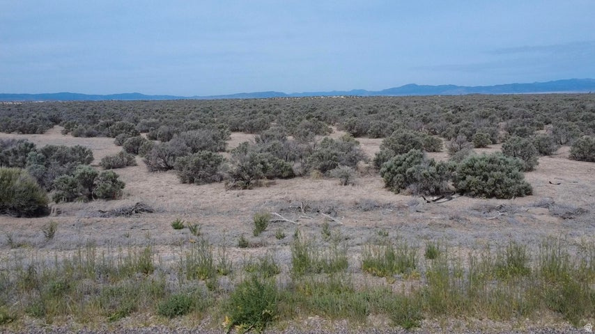 Rare opportunity to own 10 acres in Beryl, Utah with 0.5 acre-feet of valuable water rights included #71-4912 (1945). Right off of Beryl Highway with paved road access. Possible commercial applications. Perfect for building a home, cabin, barndominium, ranch property, mini farm, off-grid retreat, or recreational getaway. Plenty of space for livestock, horses, RVs, toys, gardens, orchards, or future development potential. Enjoy wide open spaces, privacy, dark night skies, and breathtaking desert and mountain views. Beryl is known for its peaceful rural lifestyle, outdoor recreation, ATV riding, hunting, camping, and easy access to Enterprise, Cedar City, and St. George. Water rights add tremendous long-term value in Southern Utah. Great investment, getaway, or future homestead opportunity.