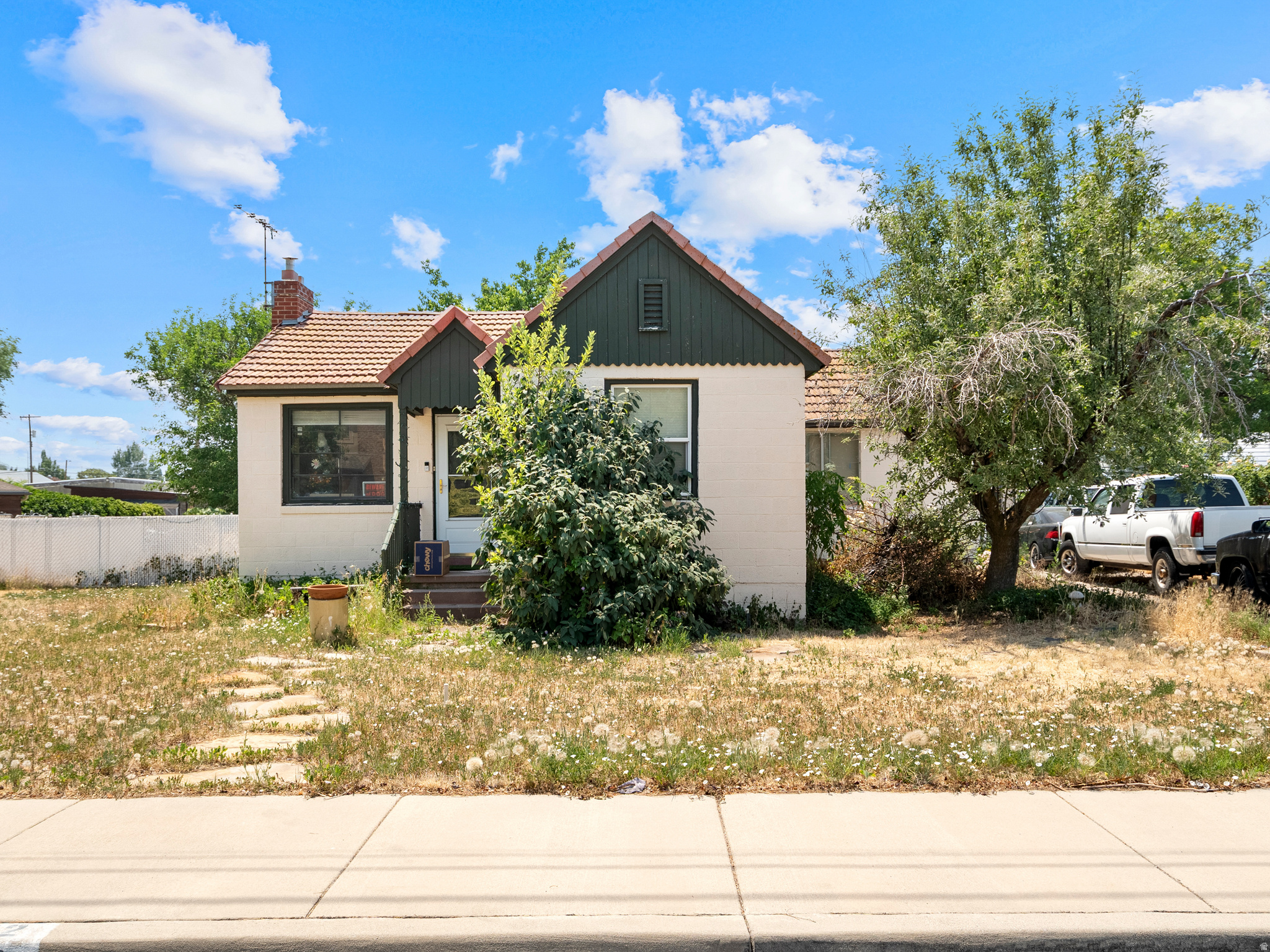 Seller Financing Available. Rare Midvale redevelopment opportunity on a large 0.74-acre lot! This property offers exceptional potential for investors, builders, and developers looking to capitalize on a sizeable parcel in a desirable Midvale location. The existing 1,920 SF home (2 bedrooms, 1 bathroom) is currently tenant occupied and is being offered primarily for its land value. Property is being sold as-is and buyers are encouraged to conduct their own due diligence regarding future development possibilities, zoning, and permitted uses. An additional adjacent opportunity exists, as a second 0.74-acre property located just two homes away will also be available for purchase. Center property between the two not listed for sale.  Outstanding opportunity for redevelopment in a growing area with convenient access to I-15, I-215, shopping, dining, and public transit. No showings until accepted offer.
