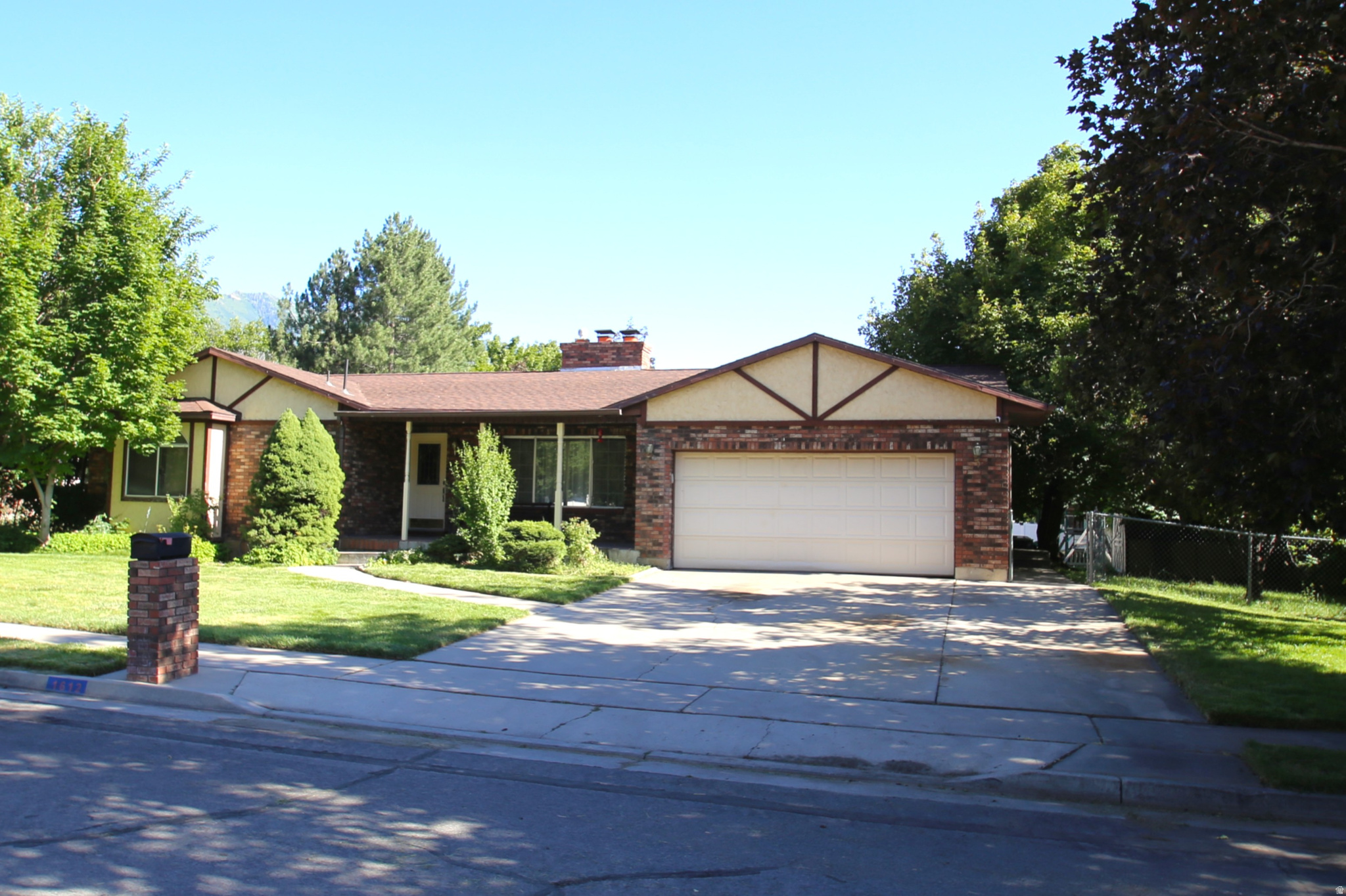 Traditional Brick Rambler 6-Bed Retreat on Over Half an Acre  Springville, UT 1612 E 450 South, Springville, UT | $680,000 | 6 Bed / 3 Bath | 0.57 Acres Welcome home to 1612 E 450 South, where small-town charm meets room to roam. Just minutes from Hobble Creek Canyon and its scenic trails, this spacious 6-bedroom, 3-bathroom home sits on over half an acre and is ready for you to make it your own. Start your mornings on the covered front porch, and rest easy knowing the big-ticket items are already handled - a 3-year-old roof and a roughly 6-year-old A/C, furnace, and 75-gallon water heater mean peace of mind from day one. Out back, a large gated yard offers plenty of room to park all your toys, plus mature plum tree and grapevines and a generous garden space for the green thumb in the family. Kids (or the young at heart) will love the jungle gym, play center, and trampoline, and a couple of storage sheds keep everything organized. When it's time to unwind, gather around the fire pit or soak in the hot tub under the large covered patio - both staying with the home for your enjoyment. Come see it for yourself, and let your imagination run with all the ways you'll make this home distinctly yours. Maybe an ADU outback?  Square footage figures are provided as a courtesy estimate only and were obtained from County Records.  Buyer is advised to obtain an independent measurement.