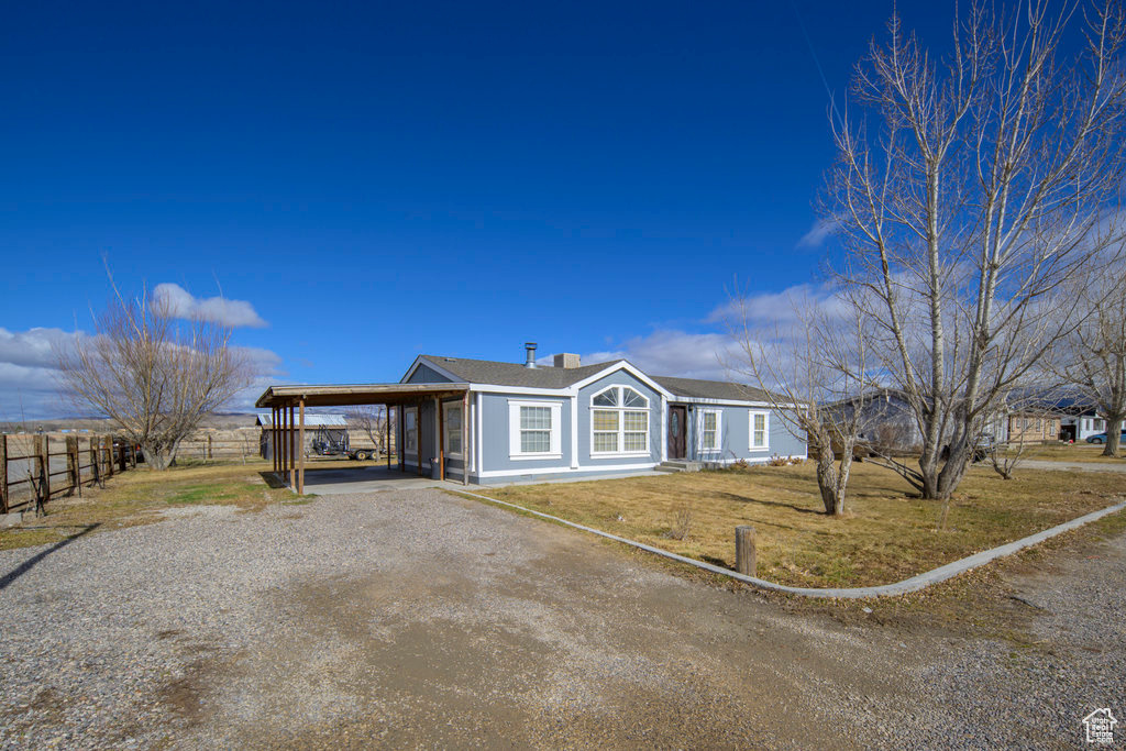 Charming rural retreat offering privacy and stunning views. The home features an open-concept living area, perfect for family gatherings. A standout addition is the oversized garage, ideal for storing your RV, boats, or creating a dream workshop. Whether you're looking for a peaceful country escape or space to pursue hobbies, this property offers the perfect blend of comfort and functionality. All information is provided as a courtesy estimate only. Buyer is advised to obtain an independent measurement/information.