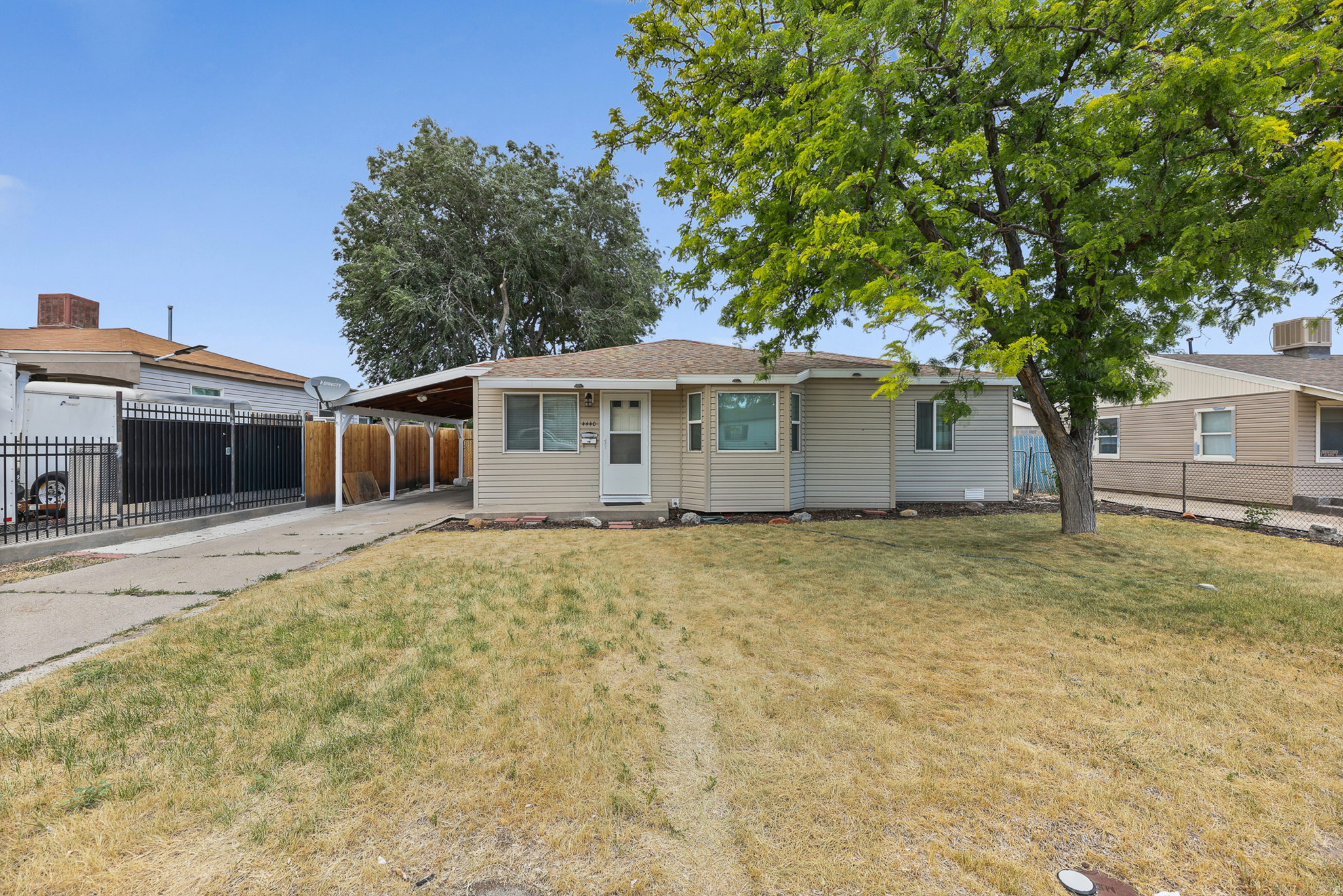 Finally a starter home at a starter price and MOVE IN READY! This 2 bedroom home has newer kitchen cabinets and vinyl floors, new carpet, new roof (2018), newer vinyl windows, newer vinyl siding, Covered Carport parking, walking distance to South Kearns Elementary, covered porch and landscaped front yard. FHA and VA Buyers welcome. Square footage per appraisal sketch.