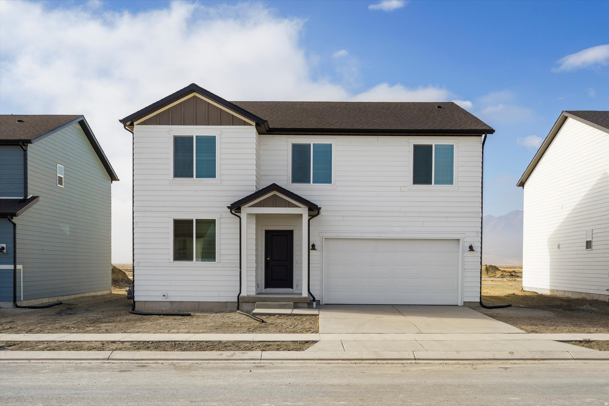 This home's beautiful open concept kitchen leads into the dining area and living room. Upstairs, enjoy a spacious loft that's perfect for multipurpose use. Unfinished basement included. Move in ready with a washer, dryer, fridge and blinds throughout! Total home approx. sq. ft. 3,662.