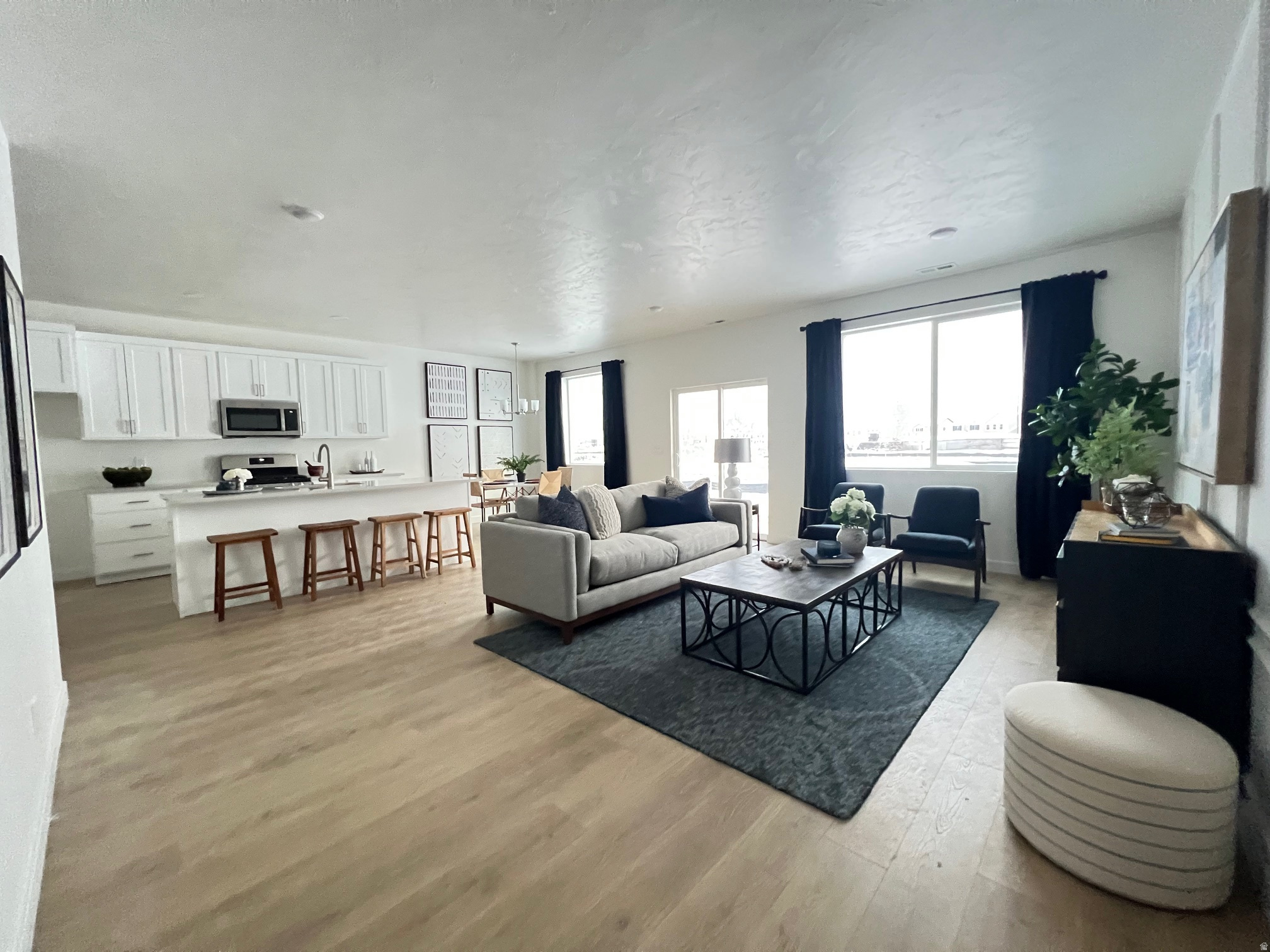 Beautiful townhome in highly desirable location. This luxury townhome has great freeway access and is near everything. This home has a 25 foot driveway, along with a fully fenced in backyard. Come to our design center and personalize this home. Home is currently under construction  (photos are of a past build)!