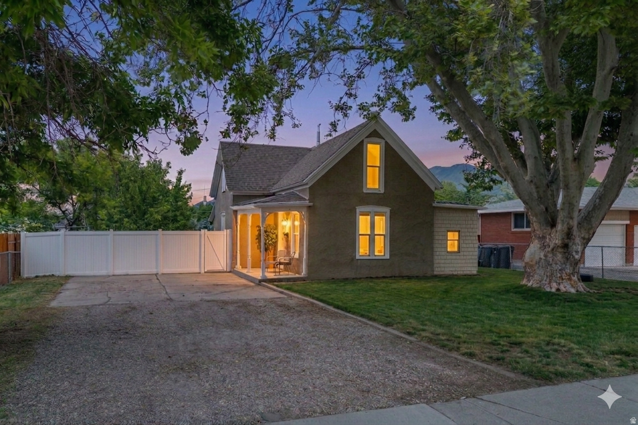 From the moment you pull up to the curb and see the classic swing swaying from the branch of the gorgeous front tree, you'll know this home is something special. This is a property with personality: boasting original moldings, grand tall ceilings, and a warmth that modern construction just can't replicate. With plenty of beautiful natural lighting, the layout is incredibly accommodating. The main floor delivers perfect convenience of single-level living, housing the kitchen, laundry, a full bath, and a spacious bedroom all on one level. Even a space to enjoy a meal in your elegant, sunny breakfast nook! Upstairs, the architectural charm continues with two additional bedrooms and an open loft, offering the perfect footprint for a growing family or remote work setup. Many aspects of this home have been updated to provide peace of mind, balancing historic integrity with modern reliability. Outside, the perfectly sized, fully fenced yard with a mature cherry tree is a well kept canvas for your backyard dreams. Located in a vibrant downtown pocket, you are minutes away from Spanish Fork's best restaurants and even a quick drive to Costco and other stores. Come experience the perfect match of history and modern ease, reach out to schedule your private showing today!