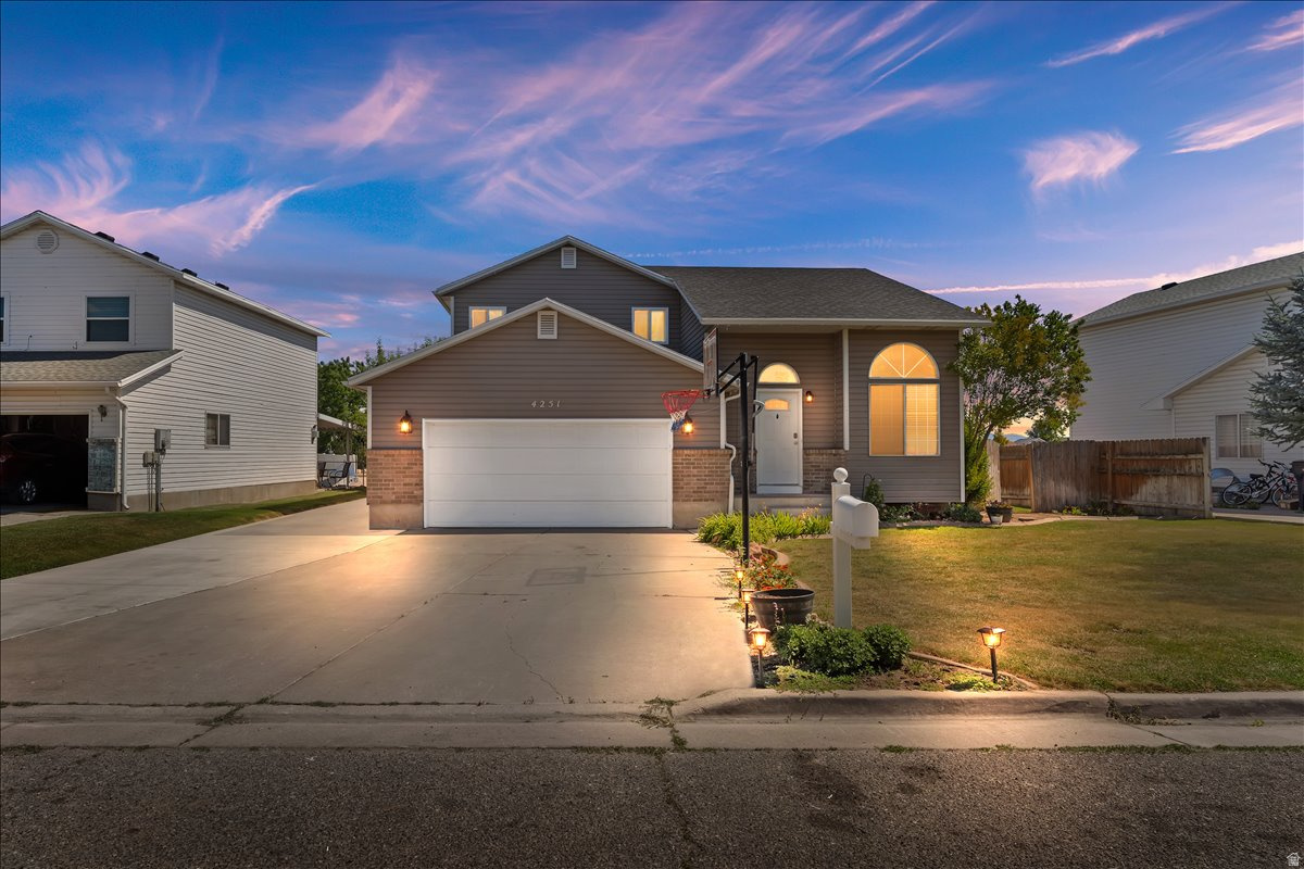 This inviting 3-bedroom, 2-bathroom residence offers modern comforts and a serene setting with exceptional convenience. Featuring brand-new windows, a new A/C installed in 2025, PEX plumbing system upgrade completed in 2019 throughout the entire house, and luxury vinyl plank flooring installed through majority of the house, making this home is both stylish and functional. There is a lot of natural light and good amount of storage in the crawl space in the basement.  The spacious interior features top-of-the-line LG appliances and includes a massive 70" TV, perfect for relaxing or entertaining. Step outside to a private backyard oasis with mature apple trees and fully fenced backyard providing shade and privacy. With no backyard neighbors, you'll enjoy peaceful moments and lovely views of the nearby fishing pond just beyond your fence.  Additional highlights include a dedicated RV pad for easy storage and access, and a location that's hard to beat with no HOA fees. You'll be close to shopping and just a short drive from Weber University and Hill Air Force Base. Don't miss out on this fantastic opportunity, contact us today to make this beautiful home yours!