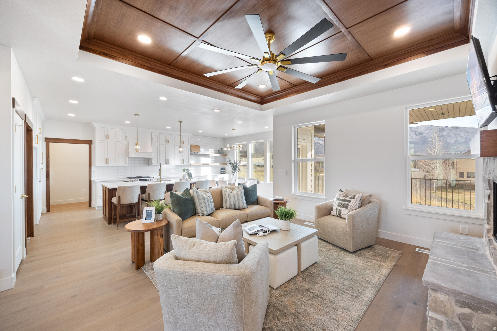 This beautiful home was built by Parade of Homes builder, BUILT CONSTRUCTION and features 7 bedrooms, 5 baths, a walk out basement and 2 bedroom ADU.    Experience luxury living in this stunning new construction by Built Construction, thoughtfully designed with custom finishes throughout and breathtaking mountain views, blending modern elegance with everyday functionality. The open-concept floor plan is filled with natural light and showcases high-quality craftsmanship, designer details, and upscale materials at every turn.  The homes seamless indoor-outdoor flow maximizes the scenic surroundings, making it ideal for both entertaining and relaxing. -Seller will contibute up to $10,000 towards closing costs-