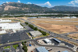 R&D-Ready, Autoliv-Built Facility   Total Building Size: 46,818 SF across two stories plus a functional basement   Site Area: 3.79 acres with 153 surface parking stalls   Clear Height: 12' in warehouse/lab areas   Loading: Two (2) dock-high doors and one (1) grade-level ramp door   Power: 800 Amp | 480V | 3-Phase electrical with extensive power drops throughout   Compressed Air: Integrated compressed air lines servicing warehouse and machine shop   Mechanical Systems:   Closed-loop hydronic system for efficient heating   Boilers and HVAC in office and warehouse   Swamp coolers for additional temperature regulation   Outside air intake plenum with louvered inlet, pre-filters, and inline fan filtration  ideal for R&D environments   Vertical Circulation: Freight elevator and passenger elevator serving all levels   Fire Protection: Fully fire-sprinklered   Roof: Rubber membrane roof with ballast   Machine Shop: Existing infrastructure supports machining, fabrication, or tool development   Interior Improvements: Open-concept offices, private offices, glass conference rooms, break area, modern finishes, and mountain views   Access & Connectivity:   Convenient access to I-15 via 31st Street   Minutes to I-80, I-84, and Ogden- Hinckley Airport   Under one hour to Salt Lake City International Airport   Location Synergy: Adjacent to Hill Air Force Base and near major aerospace employers including Boeing, Northrop Grumman, and Lockheed Martin   Labor Market: Over 443,000 residents within 10 miles; 62% hold post-secondary degrees
