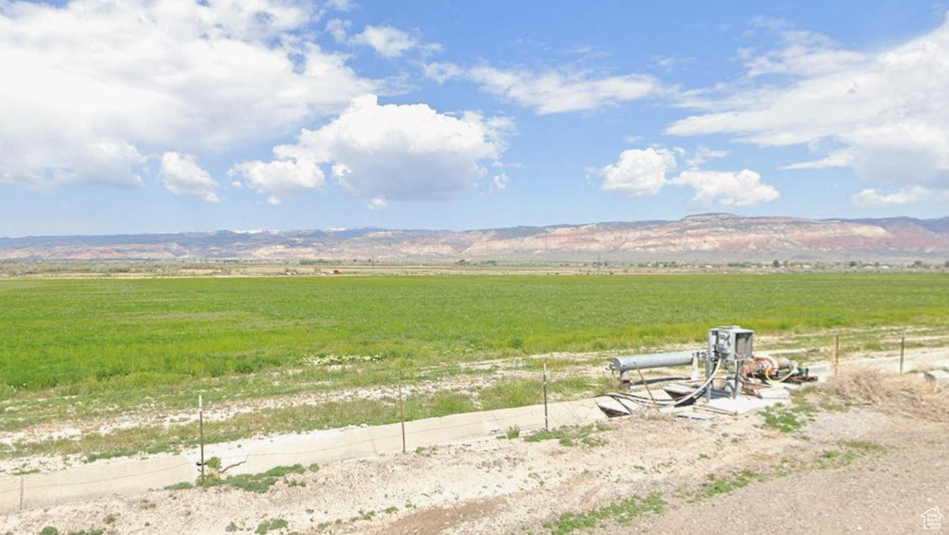 PRODUCING ALFALFA FARM WITH WATER RIGHTS 53.38 TOTAL AC. WITH APPROXIMATELY 48 AC. PLANTED IN PRIME ALFALFA. LINEAR PIVOT. 6 TOWERS. 50 HORSE POWER ELECTRIC PUMP. 3 PHASE POWER. HAS HWY  FRONTAGE ON HWY 119 PROPERTY IN THE PATH OF GROWTH, WITH POTENTIAL  FUTURE RESIDENTIAL DEVELOPMENT.