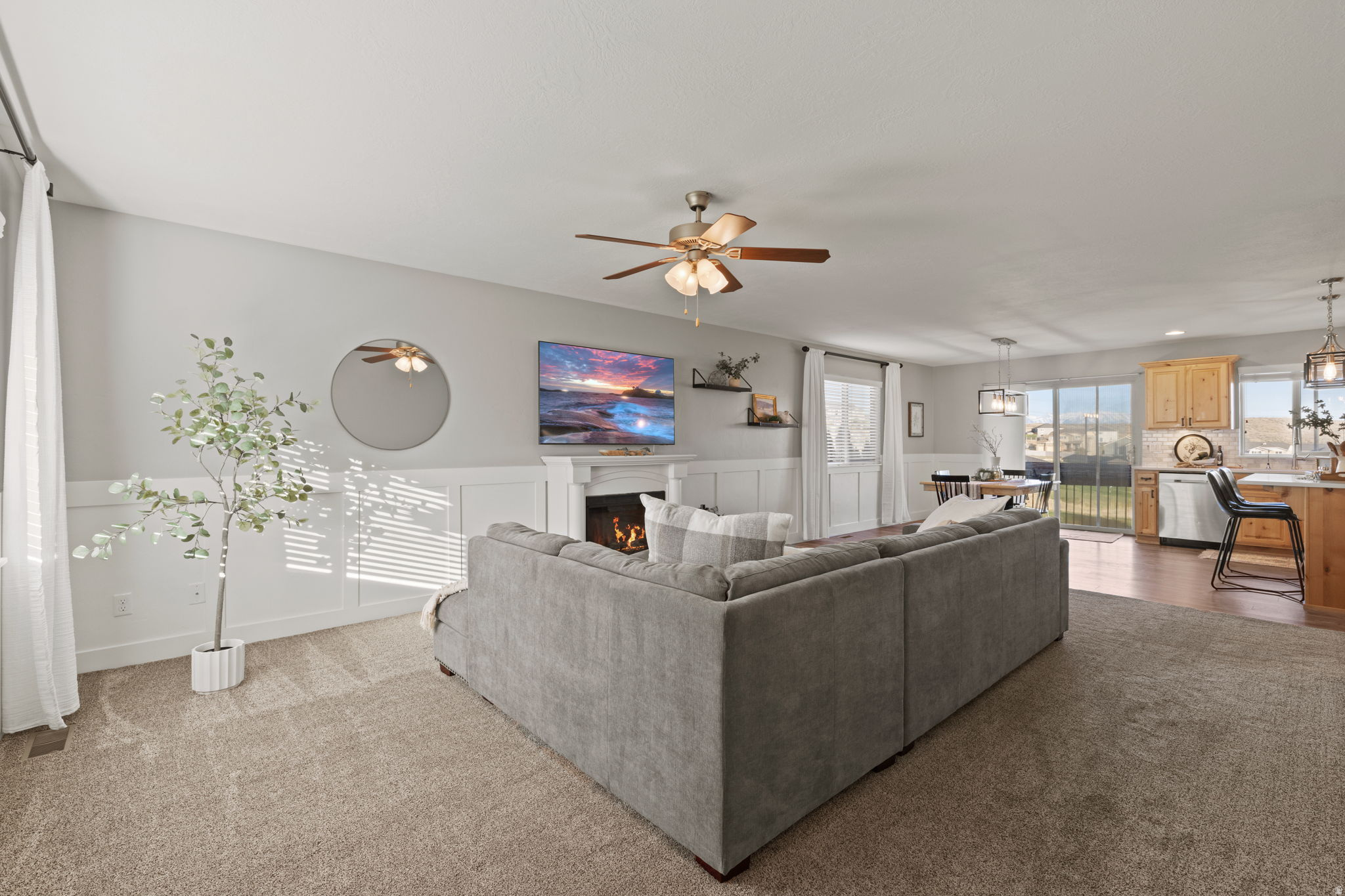 **OPEN HOUSE, SATURDAY, JUNE 20TH FROM 10 AM TO NOON** PRICE REDUCED! BRING AN OFFER! Welcome to this beautifully maintained home with stunning views overlooking the Ranches Golf Course and breathtaking views of the Wasatch mountains. Enjoy the ease of single-level living with an open, light-filled floor plan that's perfect for both everyday living and entertaining. The updated kitchen is sure to delight as it flows seamlessly into the main living areas creating a warm and inviting space for gatherings. The fully finished basement offers plenty of room for guests, hobbies, or a home office. Nestled in a quiet, serene neighborhood, this home provides the perfect balance of peace and convenience as it is located just minutes from everyday essentials and local favorites including Costco, FatCats, and Walmart. You'll love the accessibility without sacrificing tranquility.