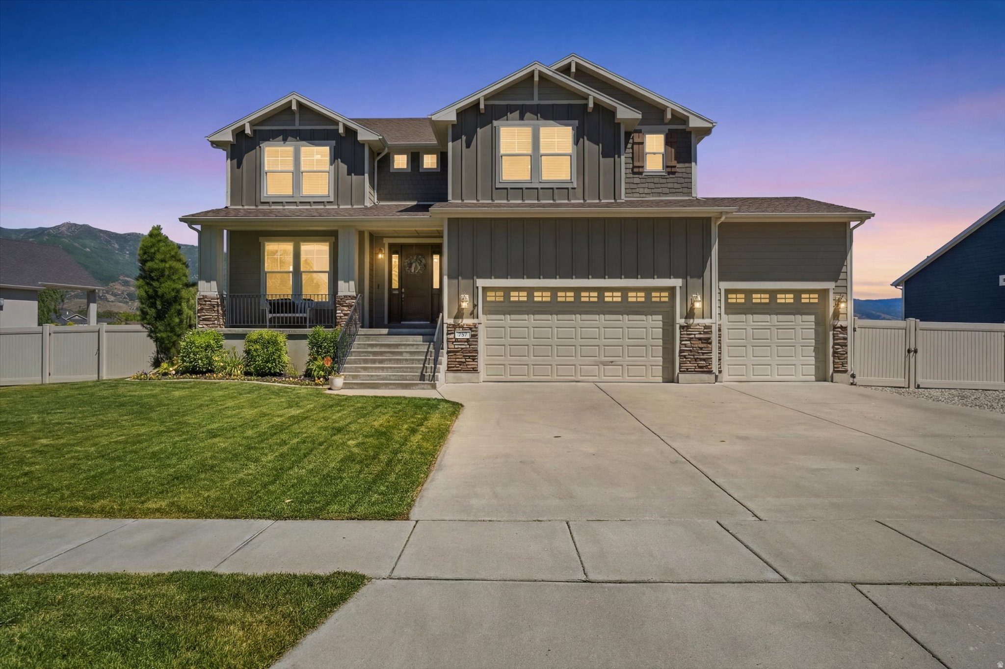 Situated in a highly desirable equestrian neighborhood in Kaysville, this light-filled home showcases expansive living spaces, a highly functional layout, and breathtaking unobstructed mountain views. Backing to open fields and community walking trails, the setting offers both privacy and a seamless connection to the outdoors. Designed with entertaining in mind, the home features large gathering areas on both the main and lower levels, along with a flexible main-floor space ideal for a home office, formal sitting room, or dining. Six oversized bedrooms-most with walk-in closets-provide comfort and versatility, complemented by abundant storage throughout, including multiple storage closets, two large basement storage rooms, and extensive overhead garage storage. The basement also features a charming under-the-stairs play area-perfect for a kids' hideaway or creative space. Additional highlights include an RV-sized gate allowing for secure behind-the-gate parking, a central vacuum system (recently updated) with 9 inlets, 2 hose systems, and a convenient kitchen broom sweep, as well as a water softener located in the garage for easy salt refill. The home is equipped with two HVAC systems and secondary laundry hookup in basement, offering efficiency and convenience for larger households. Pressurized irrigation runs $430 annually. Step outside to a spacious, flat, east-facing backyard complete with evening shade, a firepit, and panoramic mountain views. Low HOA adds significant value with access to resort-style amenities including two swimming pools, pickleball courts, walking trails, playgrounds, and more.