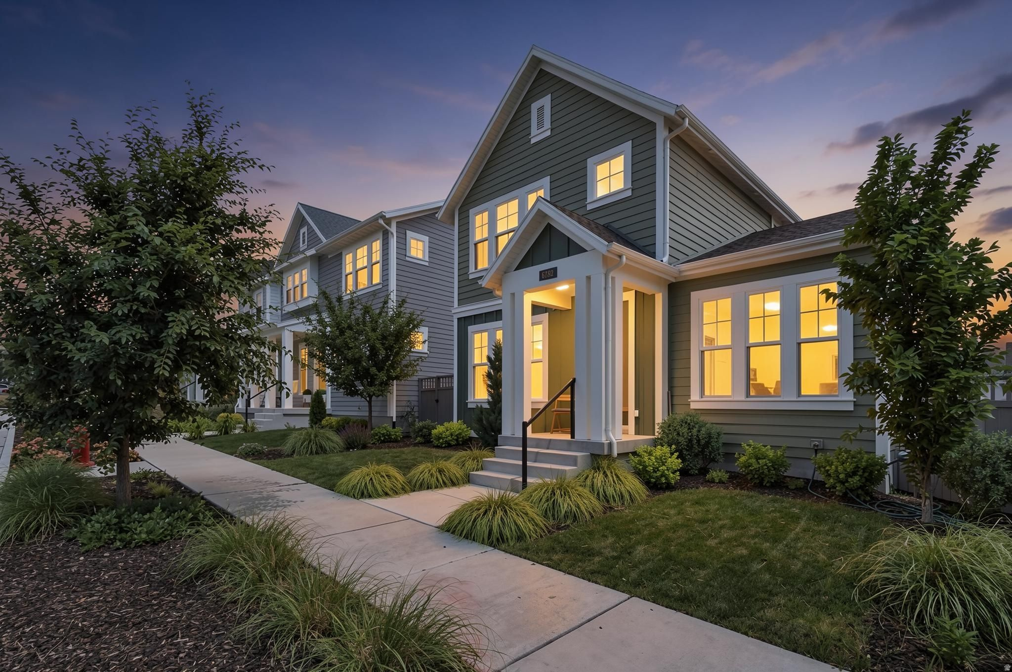 Experience elevated living in the heart of Daybreak, one of Utah's most sought after master planned communities! This exceptional residence blends sophisticated design with modern comfort, featuring expansive living spaces, beautiful finishes and abundant natural light throughout. Step inside to find open, light-filled spaces where the kitchen, dining, and living areas flow effortlessly together. The kitchen is a showstopper with a large island, quartz countertops, gas range, and two-tone cabinetry, perfect for everything from weeknight meals to dinner with friends. Upstairs, the spacious primary suite feels like a private getaway, while additional bedrooms provide plenty of space for family or guests. Need to work from home or carve out quiet creative space? This home offers not one, but two dedicated offices! The fully finished basement adds incredible flexibility with a professionally designed layout. Complete with an extra bedroom, full bathroom, office, and generous living area that's ideal for a game room, media lounge, or guest retreat. Just moments from Daybreak's scenic lakes, parks, trails, shopping, dining and community amenities, this home offers an unparalleled lifestyle in a premier location. Schedule your private showing today!