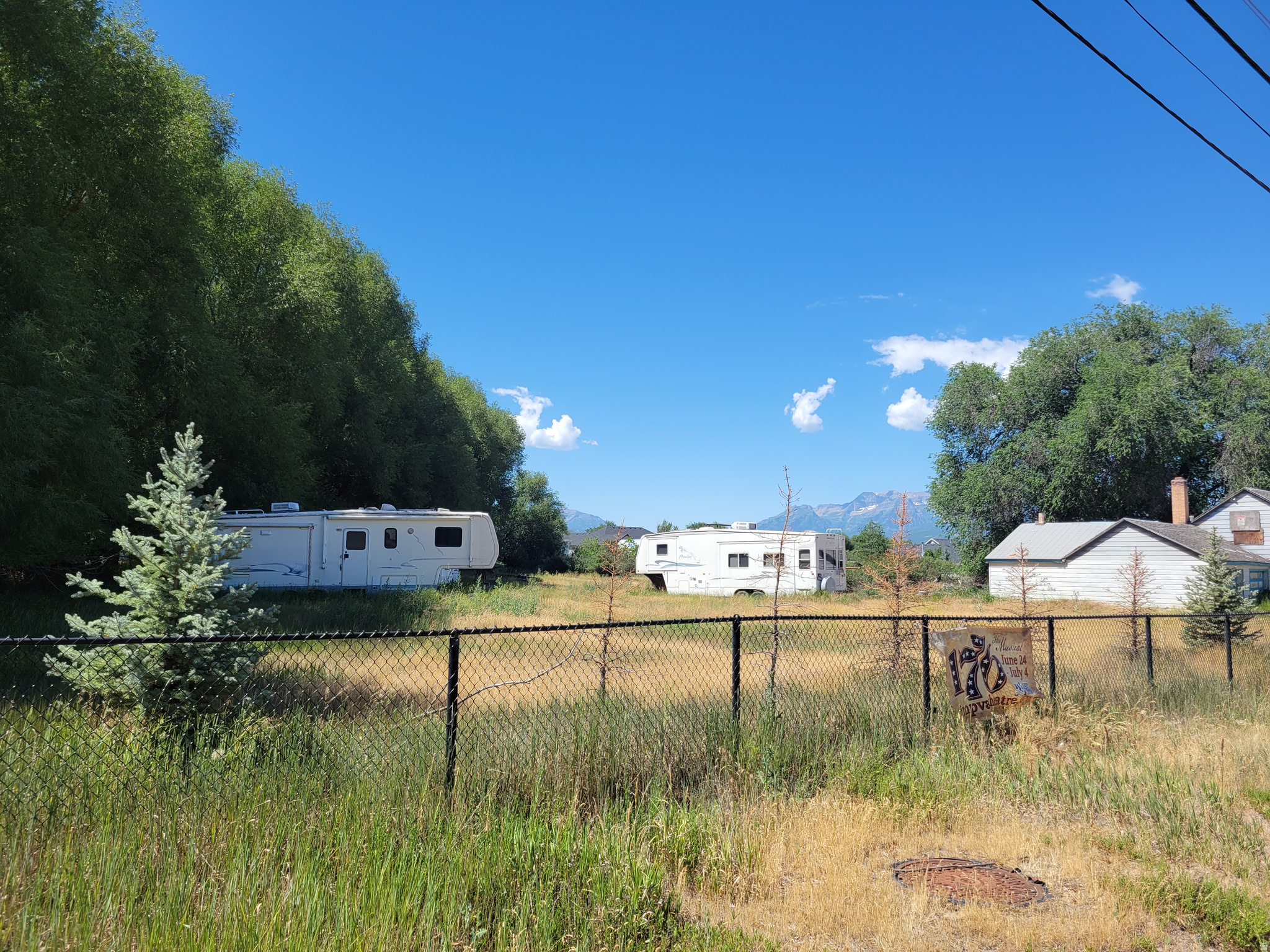 Rare opportunity to own nearly 2 acres of prime real estate in the heart of Heber City! Ideally located just a few blocks from the Heber Valley Temple currently under construction and within close proximity to world-class ski resorts, reservoirs, golf courses, and endless year-round recreational opportunities, this exceptional property offers incredible potential. With no HOA, the possibilities include creating your dream mountain valley estate or exploring the potential to subdivide the property, subject to Heber City approval. Valuable water rights and pressurized irrigation are included, further enhancing the property's value and future potential. The Lower Wasatch Canal traverses the property and is subject to an associated canal easement.  Please note that the existing home is not currently habitable, has been boarded up, and is being sold as-is. The structure will likely need to be removed, creating an outstanding opportunity for new construction in one of Heber City's most desirable locations. Buyers are advised to verify all zoning, subdivision potential, water rights, canal easements, animal use allowances, and other development possibilities directly with Heber City and all applicable agencies.