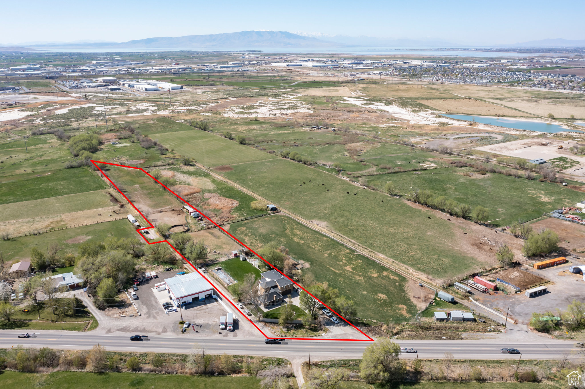 The value is in the land. Sale includes both parcels 26-055-0075 & 26-055-0076 (48 hours' notice required for showings). | Opportunity: Prime Land-Banking/Development property in Springville's Dry Creek Master Plan (see attached PDF), with future mixed-use potential and interim rental use. | Infrastructure proximity: Sewer is approx. 1 mile north on SR-51 near 1695 South (buyer to verify). | Assemblage upside: Over 30 contiguous acres to the west may be available for potential sale or joint-venture assemblage. | Water: Property currently operates on a reliable well system; an irrigation water right may be available for separate purchase. | Disclosure: Square footage/acreage per county records; buyer advised to obtain independent measurement and complete due diligence.