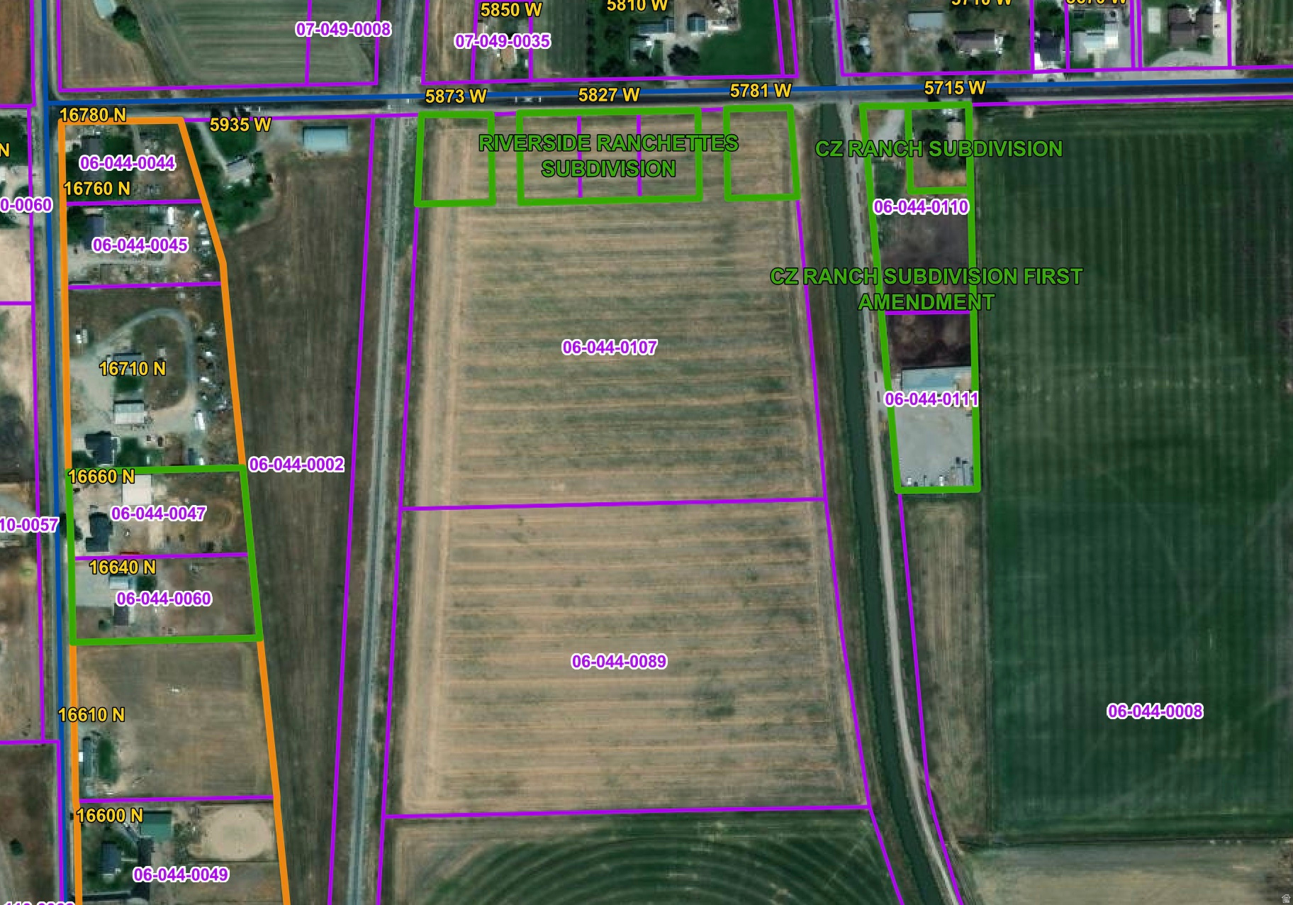 26.11 acres of beautiful flat (with a slight slope) farmland.  Property is unzoned and does include 26.11 bear river canal water shares.  Seller is willing to keep the water and lower the purchase price.  Both 60 foot accesses are included with the property to allow for development in the future.  Offering includes parcel 06-044-0107 - 12.65 acres and parcel 06-044-0089 - 13.65 acres.
