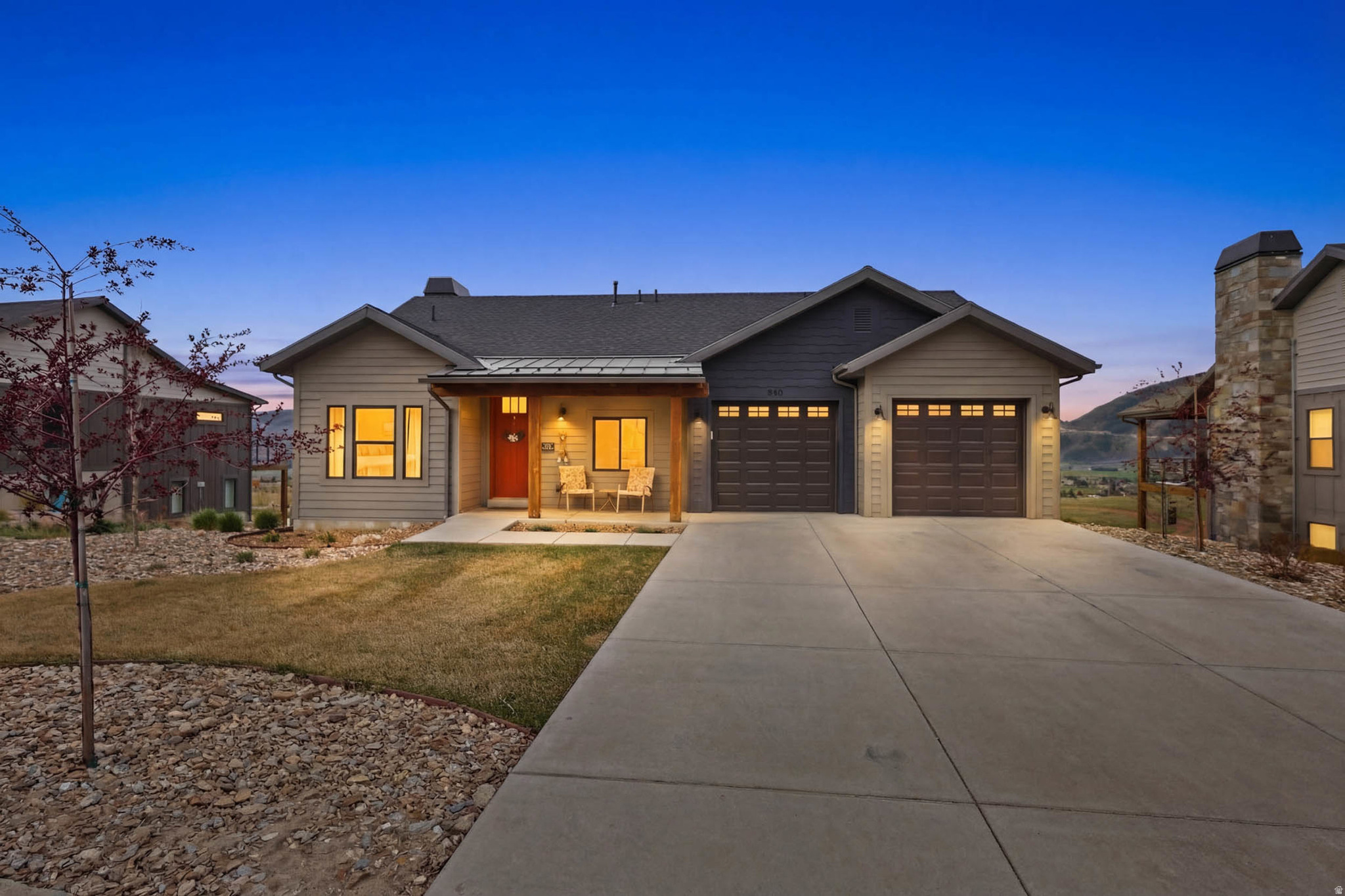 HUGE price reduction, now offered at $1,435,000 a rare opportunity to own at the Bridges community!  Pineview Reservoir views  Walkout basement  Short-term rental approved. Perfectly positioned in the Bridges community, you will love this 2022-built rambler offering 3,606 sq ft with unobstructed mountain and Pineview Reservoir views and a full walkout basement. The main level features a bright and open great room with large windows that showcase the views, a beautiful fireplace, and a primary suite on the main level with a luxury bathroom and large walk-in closet. The kitchen is thoughtfully designed with quartz countertops, a gas range, and abundant cabinetry, flowing seamlessly into the dining area and main living space. Just off the main living area and primary suite, you'll find a large partially covered deck, perfect for taking in the stunning views, relaxing, or entertaining. The walkout basement offers incredible versatility with additional living space, including multiple bedrooms, bathrooms, a full kitchen, and a private entrance, along with a large additional family room or game room. Outdoor living includes a covered patio, open patio, and hot tub, all positioned to take in the surrounding views. The lot is fully landscaped with automatic sprinklers and low-maintenance xeriscape elements. Located just minutes from Powder Mountain, Pineview Reservoir, and Wolf Creek Golf Course, with access to hiking and biking trails throughout the community. HOA includes landscaping, irrigation, and common area maintenance, with a future clubhouse and pool planned. Fiber internet available. Whether you're looking for a luxurious full-time residence, second home, or a property with short-term rental potential, this home offers scenic views, flexibility, and mountain living at its best.