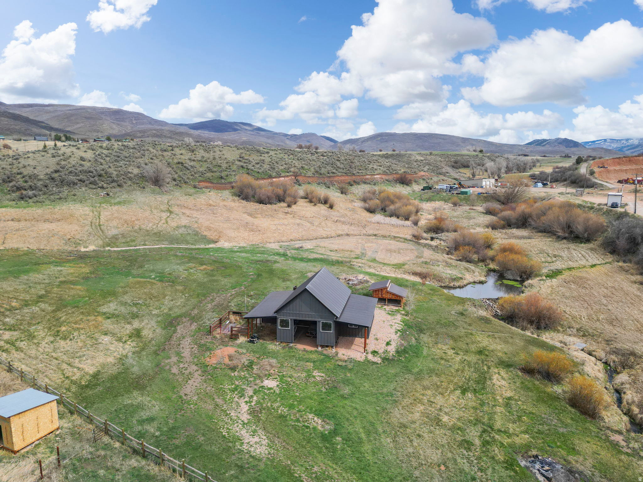 Nestled in the heart of Peoa, this stunning 5.38-acre residential parcel offers the perfect blend of peaceful rural living and convenient access. The property features year-round access and is ready for your vision. A beautiful barn on the property adds both charm and functionality, perfect for storage, hobbies, or future agricultural use, enhancing the property's country appeal. A nice pond further elevates the setting, creating a serene focal point and adding to the land's natural beauty. Enjoy proximity to endless outdoor recreation while remaining just a short drive from the amenities of Kamas and Park City.