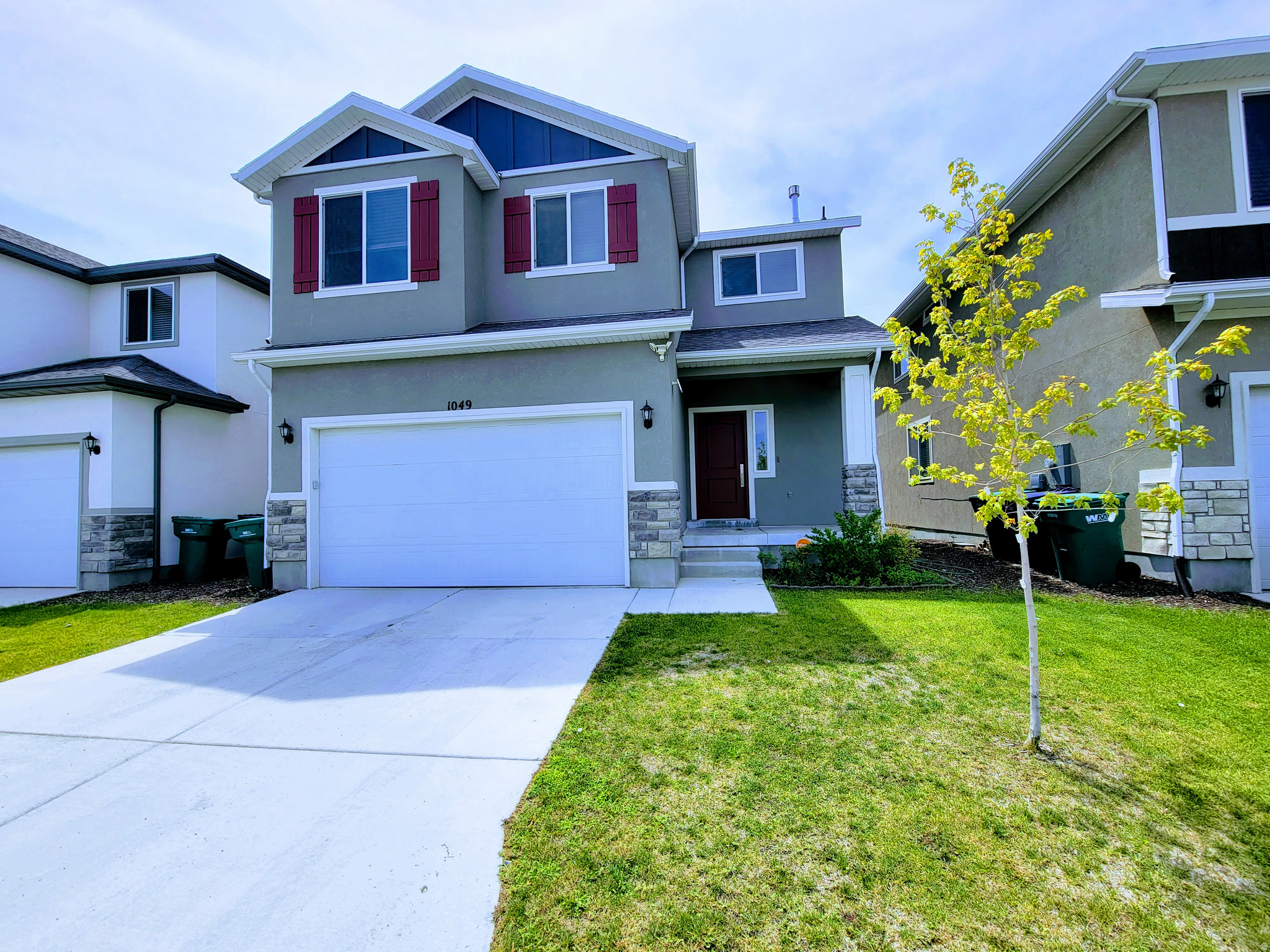 1049 Albion Meadow Way offers modern living in the heart of Bluffdale with stylish finishes, functional spaces, and convenient access to shopping, dining, parks, and commuter routes. This home features rare and coveted 9 FOOT TALL BASEMENT CEILINGS!  This well-maintained home features an open-concept layout filled with natural light, a spacious kitchen with ample cabinetry and counter space, and comfortable gathering areas designed for everyday living and entertaining. The primary suite provides a relaxing retreat with generous storage and a well-appointed bath. Additional bedrooms and flexible living spaces offer options for a home office, fitness area, or guest accommodations.  A standout feature of the home is the custom 9ft tall basement with a high end built in movie theater, thoughtfully designed to deliver an immersive entertainment experience. Enjoy a massive wall-to-wall projection screen, premium surround sound, and a dedicated theater setting that creates a true cinematic atmosphere right at home. Whether hosting movie nights, watching sports, or gaming, this impressive space is built for exceptional audio and visual enjoyment.  The fully usable outdoor space offers room to relax, garden, or entertain, while the location provides convenient access to schools, trails, recreation, shopping, and dining. Combining comfort, functionality, and upscale features, this Bluffdale home is designed for both everyday living and memorable entertaining.  Come make this beautiful house your new home!     Square footage figures are provided as a courtesy estimate only and were obtained from County tax records .  Buyer is advised to obtain an independent measurement.  Property is being sold as is.