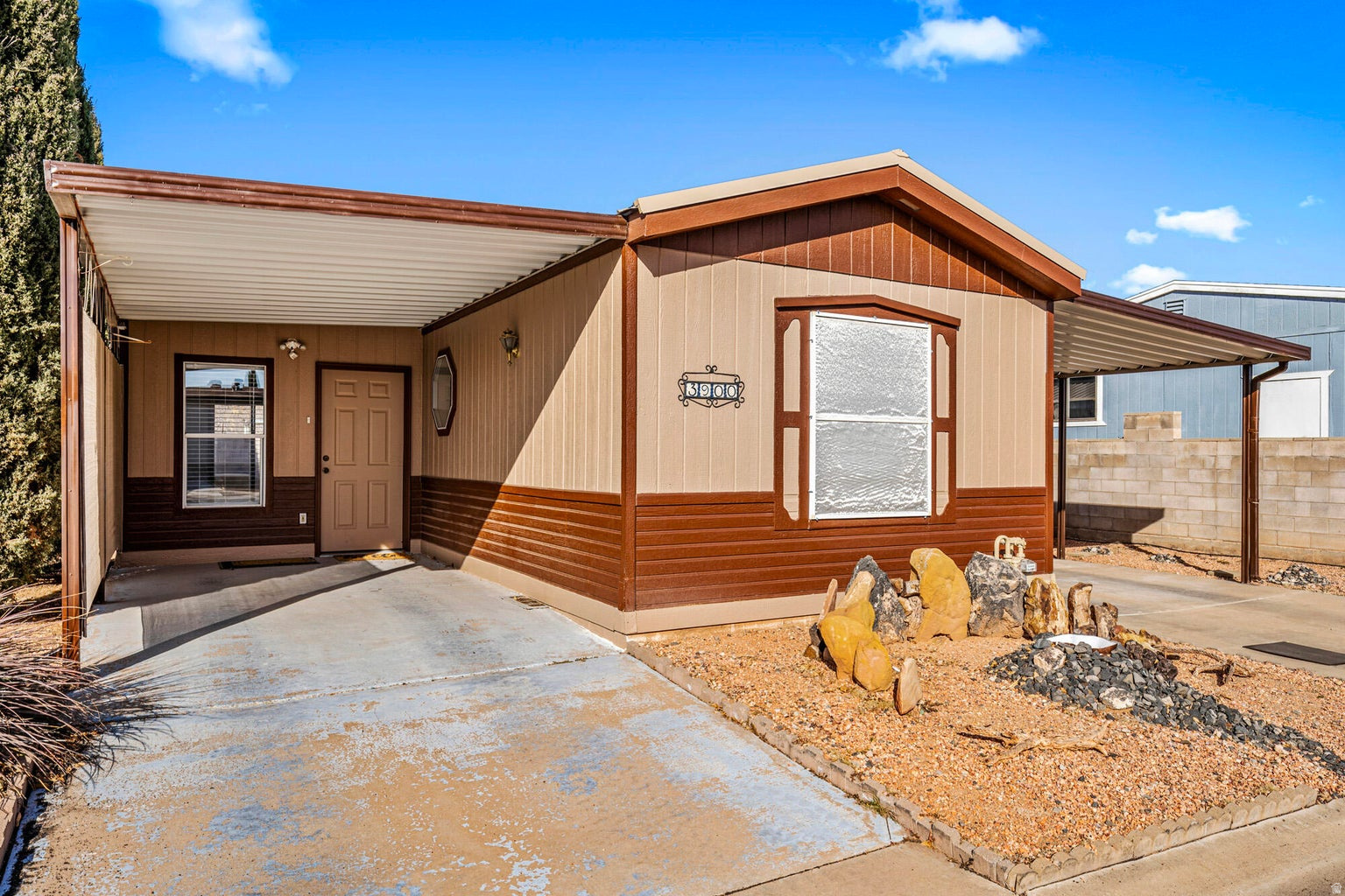 Welcome to the vibrant lifestyle at the 55+ Lava Bluffs Community. Newly remodeled 3 bd, 2 bath home is designed for easy living. Built for comfort, this home features new metal roof, all new LVP and carpet, new paint, new blinds, new bath vanity and all new lighting. Stunning pine wainscoting and bookcase makes it feel warm and cozy. Kitchen has new countertops and a bar for extra seating or preparing food. 2 bonus rooms give you flexibility for an office, workout room, extra bedroom, etc. The exterior has new paint, features low maintenance landscaping, 2 carports, and a garage with tons of storage. A workshop is ideal for hobbies or projects. Large, covered patio in backyard. Residents have access to a clubhouse. Located close to golf courses, hiking & biking, & boating.