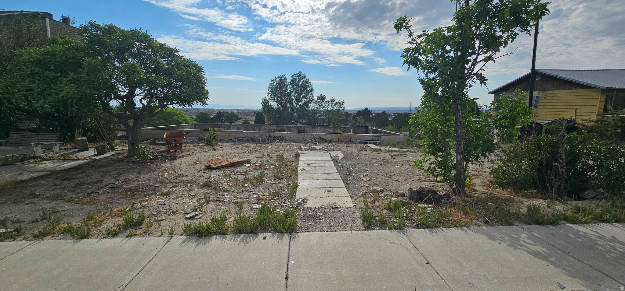 Build Your Dream Home with Incredible Views! Rare opportunity to own a prime homesite with an existing foundation already in place, saving you time and expense as you begin your new build. Perched on an elevated lot, this property offers breathtaking panoramic views of the surrounding valley and mountains, creating the perfect backdrop for your future home. Enjoy the convenience of an established neighborhood while designing a custom home to fit your vision. The lot offers plenty of space for outdoor living, entertaining, and landscaping, with scenic vistas you'll enjoy every day. Whether you're a builder, investor, or someone looking to create your forever home, this property is full of potential. Don't miss your chance to build in a location that combines spectacular views with endless possibilities. Come walk the property today and imagine the home you've always wanted!
