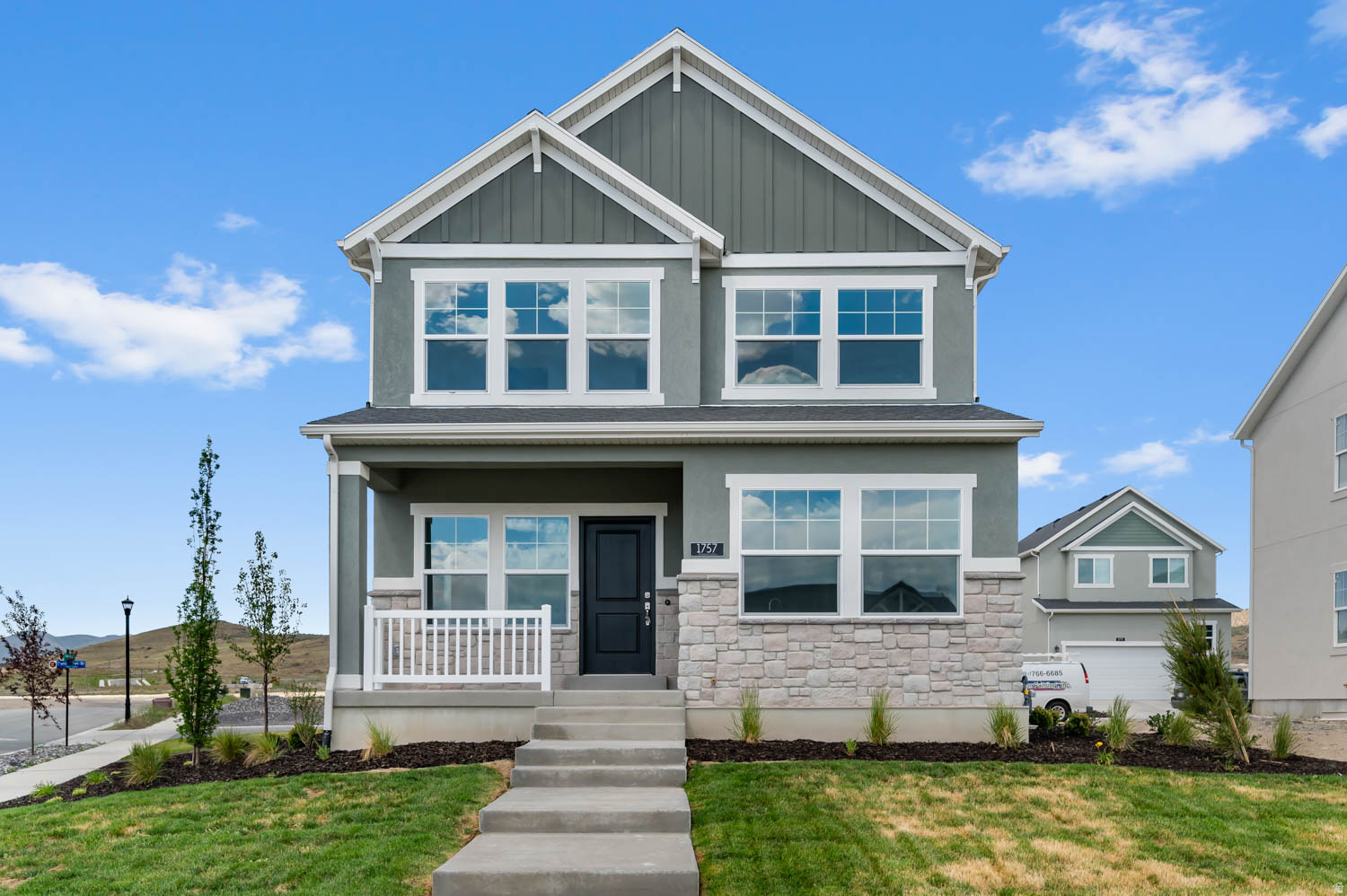 Experience elevated living with the thoughtfully designed Rockport home! Enjoy a blend of style and durability with laminate hardwood, vinyl tile, and carpet flooring throughout. The home is enhanced with craftsman style base and casing, modern can lighting, energy-efficient features, and a tankless water heater for added convenience and savings. The kitchen showcases sleek gray laminate cabinetry paired with elegant quartz countertops and a full suite of stainless steel gas appliances-perfect for both everyday living and entertaining. The owner's bathroom offers a spa-like retreat with cultured marble shower surrounds and satin and brushed nickel hardware, completing this well-appointed home. Comes fully landscaped for a turn key experience!