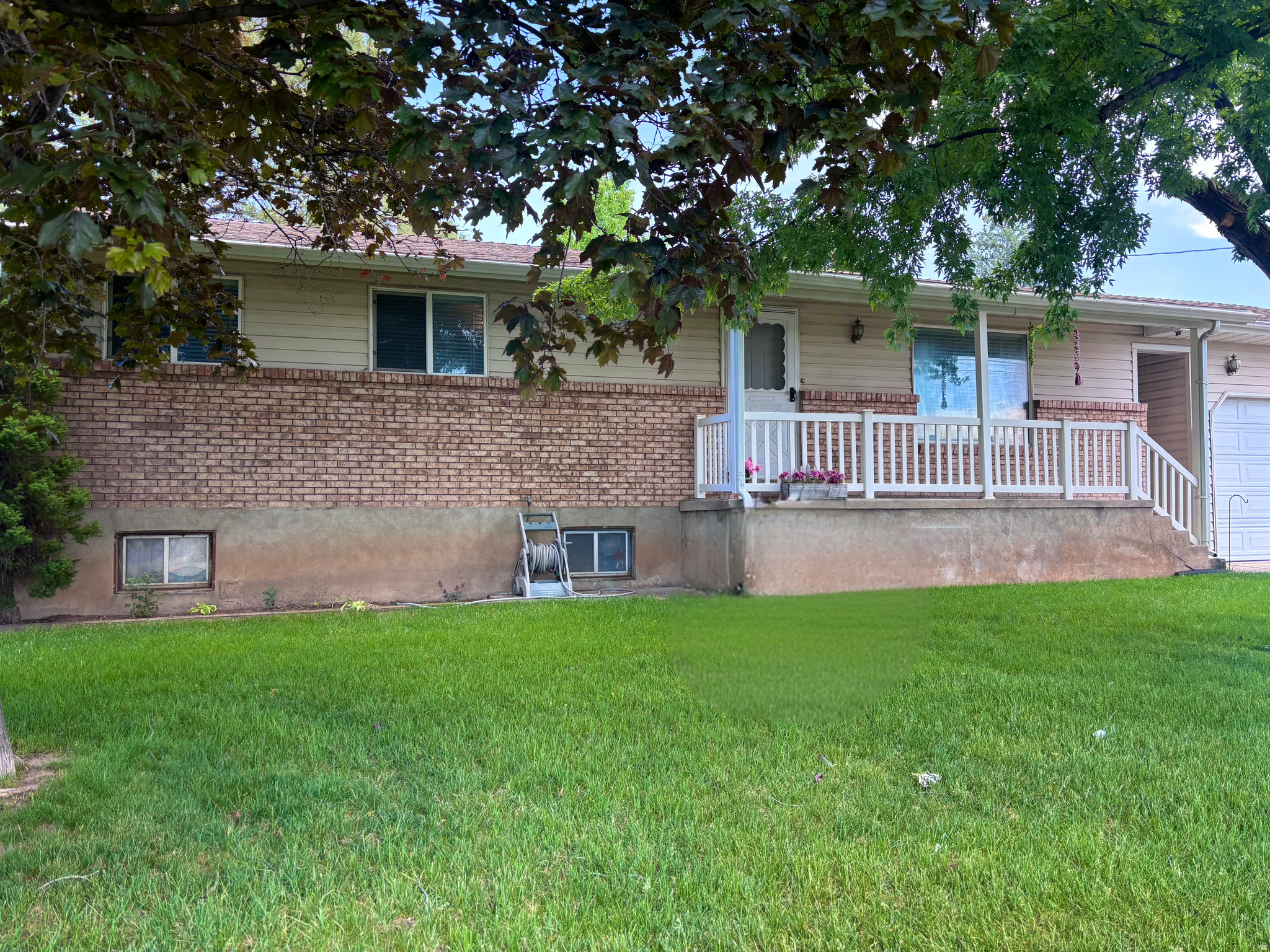 Don't miss the opportunity to make this amazing Hooper property your own! Built by the owner, and only lived in by this owner, the home offers solid structure and no shortcuts. Beautiful yard with mature landscaping, and beautiful views. This home offers a workshop for cars in the garage, with a walk-in pit to work underneath vehicles as well! Brand new roof & water heater. The home is ready for some sweat-equity to make your own with paint, flooring and other minor or preferred updates. Parts of the home were modified for wheelchair access, along with a wheelchair lift in the garage. Secondary water is available, needs connected. Coveted west-facing home. **more pics coming soon, basement getting boxed up and organized**   Square footage figures are provided as a courtesy estimate only and were obtained from County .  Buyer is advised to obtain an independent measurement.