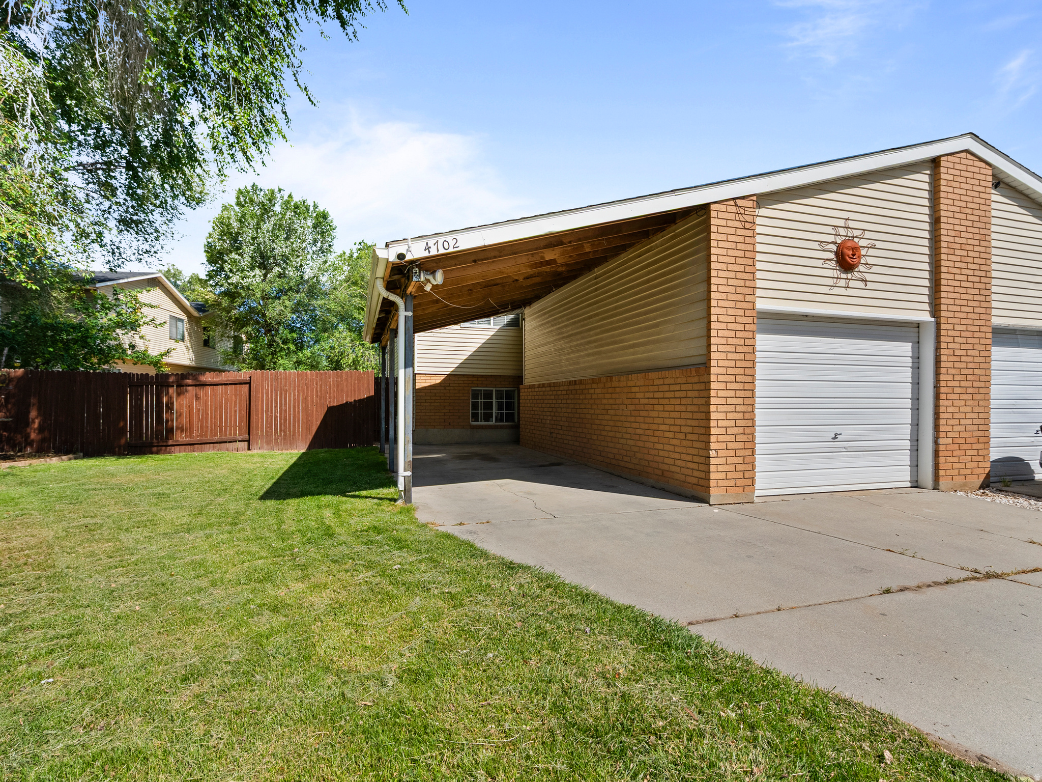 Live where convenience meets calm. Perfectly located in the heart of the valley, this inviting home puts you just minutes from I15 for an easy Salt Lake commute-yet feels a world away with the Jordan Parkway Trail just a 2minute stroll from your door. Morning jogs, sunset bike rides, fishing spots, and miles of scenic pathways are all part of everyday life here. Inside, you'll love the natural flow and functional layout that makes the home feel both comfortable, calm, and connected-ideal for daily living and entertaining alike. This home also boasts the biggest fenced backyard in the neighborhood with a mature apricot tree, room for a little garden, and plenty of room for fido to run. Enjoy a rare blend of location, comfort, and lifestyle! Hurry, this home will sell quickly. Owner/Agent