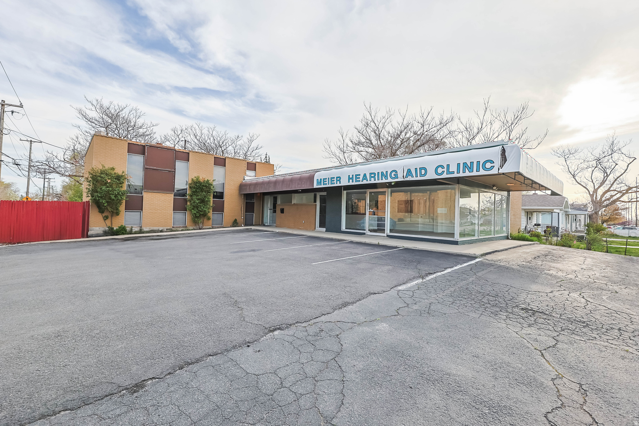 Strategically positioned on a prominent corner lot, this commercial property offers exceptional exposure and flexibility for a variety of business uses. Zoned within the Commercial Neighborhood District, the building provides the potential for possibility a separate suite featuring its own entrance and address-ideal for owner-users or investment income. Property Highlights: Excellent visibility and access on a corner lot. Opportunity to subdivide for dual tenancy. Showroom space ideal for client-facing operations. Multiple private offices/rooms. Newly constructed full kitchen and dedicated break room. Laundry facility. Full bath with shower/tub. Generous storage areas and adaptable flex spaces. Functional loading dock for deliveries and operations. Handicap-accessible restroom on north main level. Potential for expanded rear parking to accommodate increased traffic. This property presents a rare combination of visibility, versatility, and future upside-an ideal fit for a wide range of professional, retail, or service-based users. Some of the Permited (P) and Conditional uses are: Art Gallery/Studio (P), Child Care Center (C), Cosmetology (P), Grooming Services, (P), Home Occupation (P), Medical/Dental/Health Care (P), Office/Professional (P), Restaurant (P), Retail (P), Upholstery /Tailoring Shop (P). For additional Permitted Uses and Conditional Uses See attachments. Seller will not consider Seller Financing. Square footage figures are provided as a courtesy estimate only and were obtained from County Records . Buyer is advised to obtain an independent measurement and verify allowable uses.