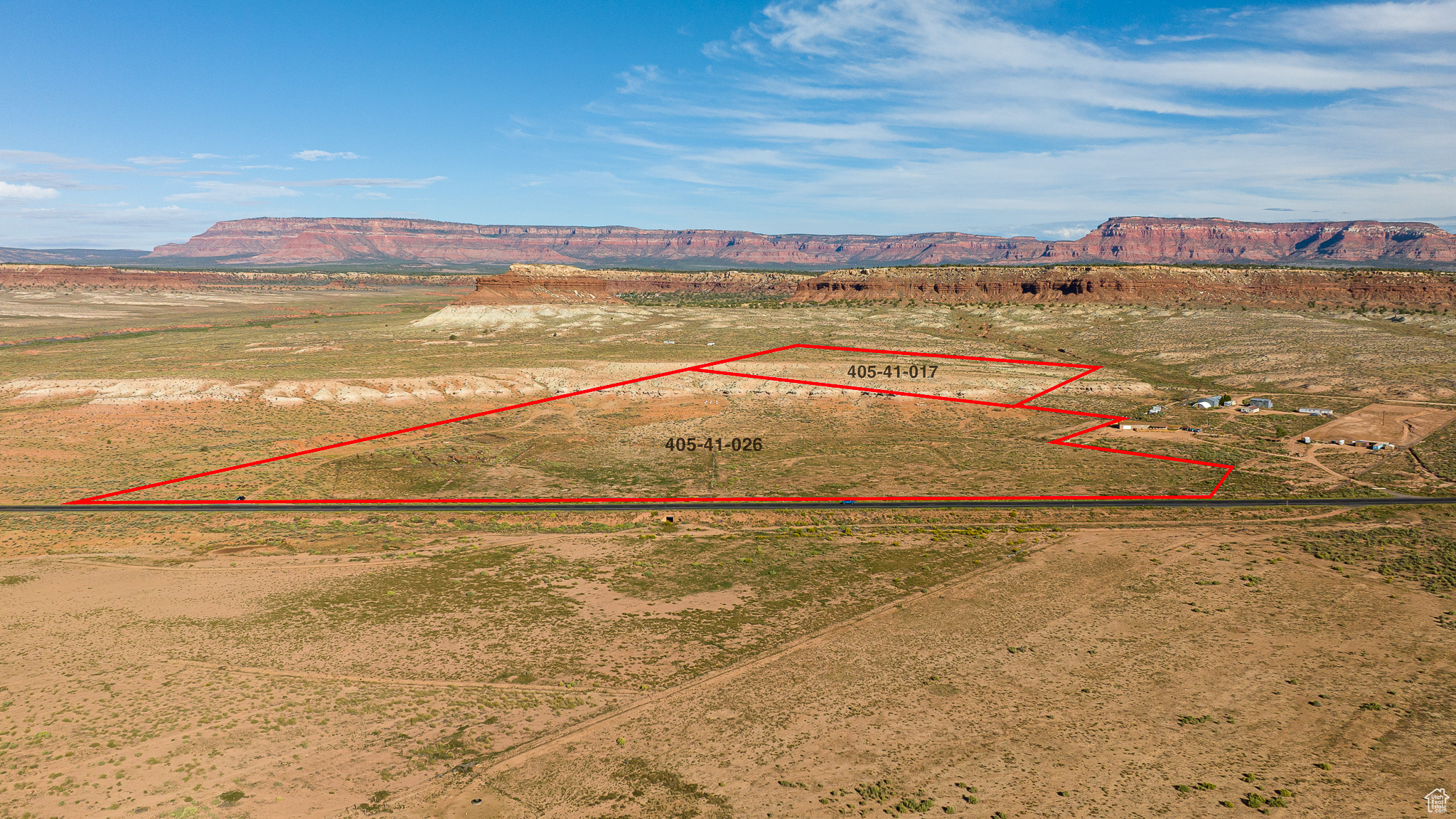 This unique 46.6-acre property, comprised of two parcels, offers a rare combination of size, location, and infrastructure. Bordering Highway 389, the land features approximately 1,808 feet of direct highway frontage-ideal for high-visibility commercial opportunities. Whether envisioned as a retail hub, service station, storage facility, or future mixed-use project, this property provides unmatched access for business development. zoned agricultural, the property already has a city water connection-a scarce and valuable feature in this area-enhancing both immediate utility and long-term potential. Its proximity to Fredonia, AZ, and its position along the gateway corridor to Kanab, Lake Powell, and the North Rim of the Grand Canyon ensures a steady flow of local and tourist traffic. With ample acreage for expansion, multiple entry possibilities, and the flexibility of two separate parcels, this property presents an incredible investment opportunity for developers, entrepreneurs, or those seeking to establish a commercial footprint in Northern Arizona. Buyer must verify all details.