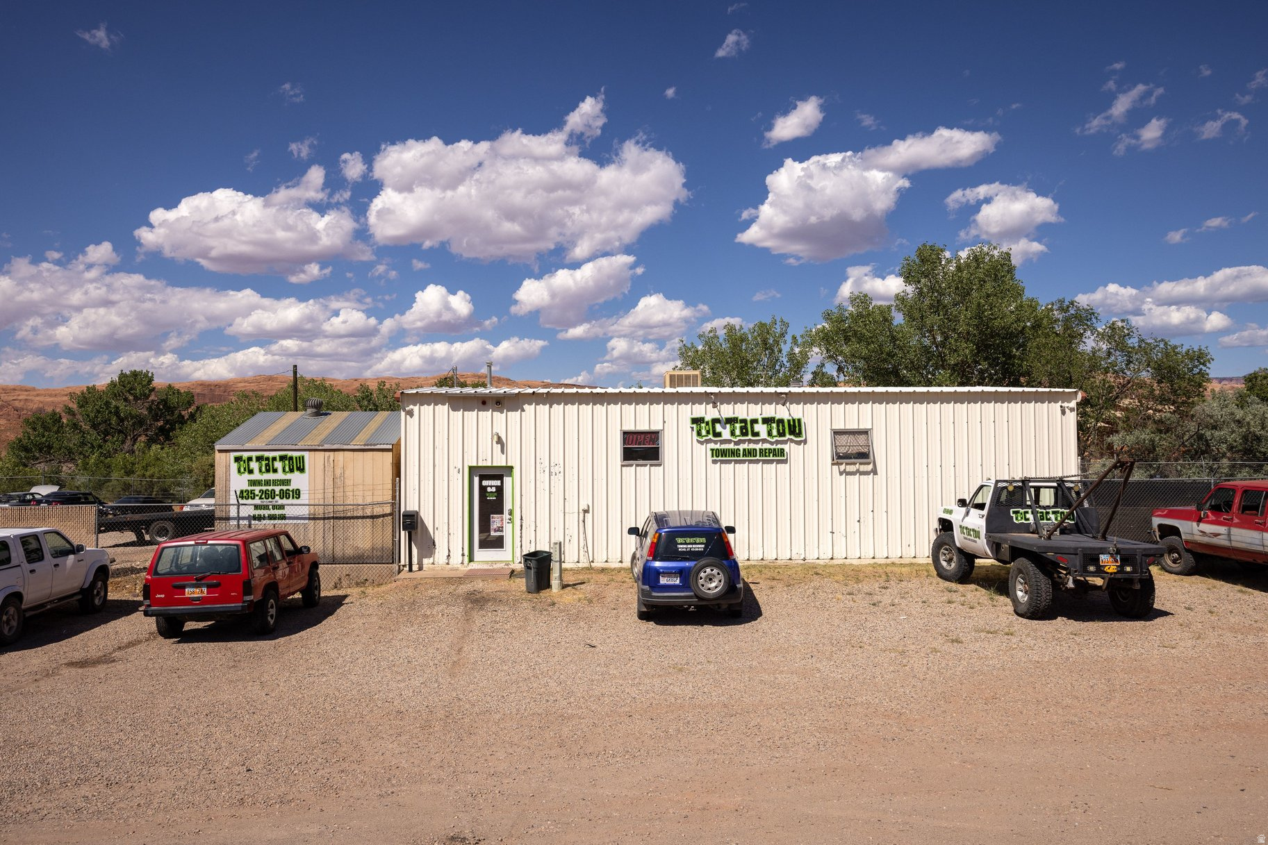 Commercial Opportunity with Highway Visibility & Rim Views in Moab!  ENDLESS POTENTIAL awaits with this exceptional highway commercial property located on the south end of town. Situated on 0.89 acres with commanding rim views, this high-visibility location offers outstanding exposure for a wide range of business ventures. With convenient highway access and an existing building already in place, this property is primed for immediate use or future expansion.  At the center of the lot is a 1,546 square foot commercial building, providing a strong foundation for your next enterprise. The structure includes a small office area ideal for customer interaction and a functional shop space that can be adapted to meet a variety of operational needs. Whether you're considering retail, food service, automotive, professional services, or childcare, the layout and lot size support flexibility and growth.  The generous parcel size allows for additional parking, outdoor use, or future development, making it easy to scale your business or enhance the customer experience-especially with the stunning surrounding views. This is a rare opportunity to secure a highway commercial property with both infrastructure and expansion potential in one of Utah's most sought-after markets.