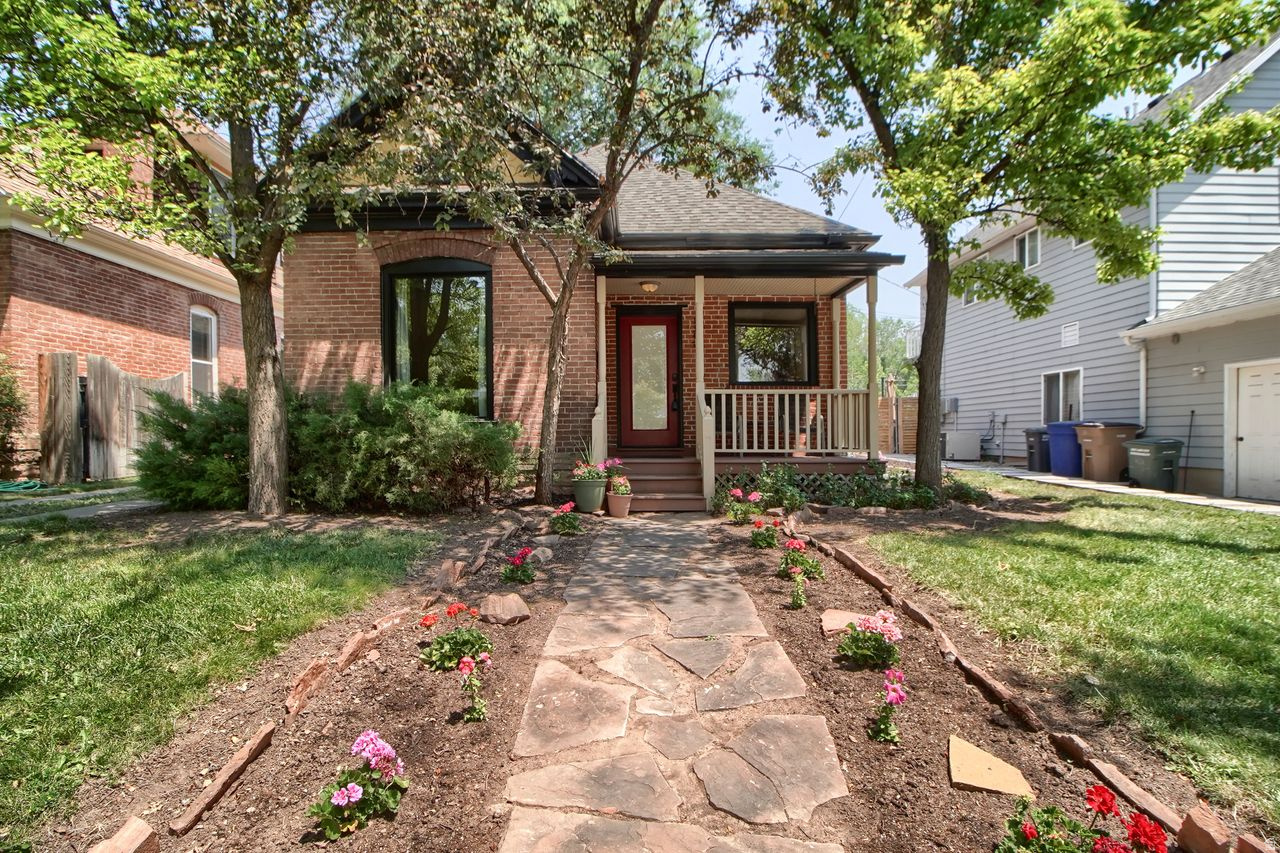 Experience the perfect harmony of historic character and modern efficiency in this enchanting Victorian-style home, ideally located in one of Salt Lake City's most coveted neighborhoods between 9th & 9th and Sugarhouse. This residence offers the rare convenience of single-level living paired with an incredible lifestyle, inviting you to start your mornings with a run at Liberty Park, a casual coffee at The Red Moose, or a stroll through a vibrant, artsy environment filled with unique boutiques, cafes, and local eateries.Inside, the home flows effortlessly from the front door to a bright, open kitchen and primary bedroom, both highlighted by high ceilings and skylights that invite natural light throughout the day. The versatile front room serves perfectly as a home office, den, or third bedroom, while the backyard serves as a private urban oasis featuring a stamped concrete patio, mature fruit trees, and ample space for gardening, all set against a beautiful backdrop of mountain views. Beyond its charm, the property is a masterclass in modern comfort, featuring 2025 solar panels for lower utility costs, additional attic insulation, a newer tankless water heater, and double-paned windows throughout most of the main level. Added peace of mind comes from an existing Vivint security system with cameras that stay with the home and a roof that is only about 11 years old. With the added benefit of a rare two-car garage and a spacious, separate-entrance basement for storage, this home offers a unique, worry-free blend of walkability, classic elegance, and thoughtful, sustainable updates that are truly difficult to find in the heart of the city.