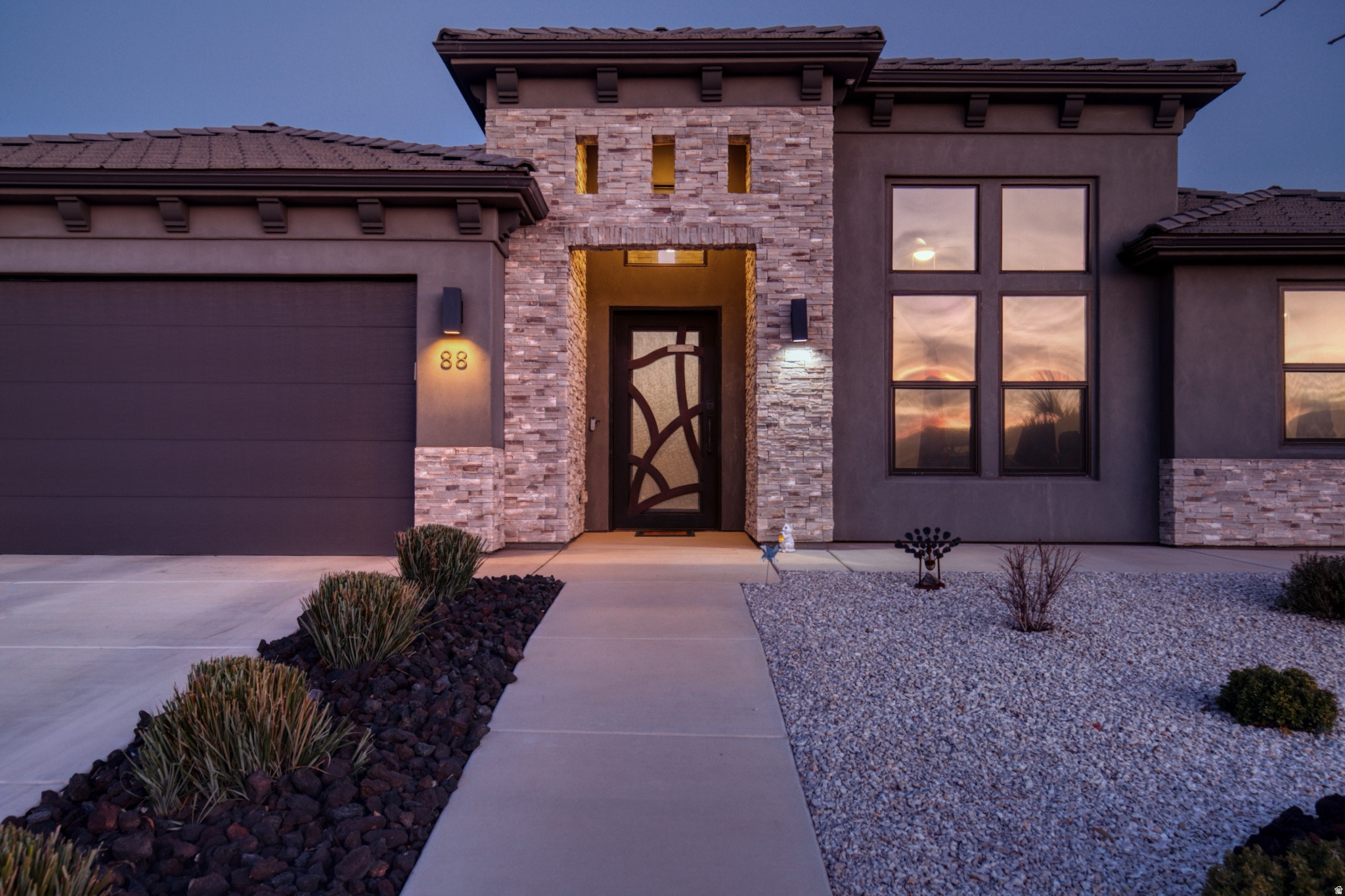 Spacious 2,790+ Sq Ft Custom Home with 5-Bedroom Potential This beautifully designed single-level custom home offers over 2,790 sq ft of modern living with upgrades throughout. The interior features 9' ceilings, tile floors with upgraded carpet, and a massive primary suite with spa-inspired bath and oversized walk-in closet. Flexible floor plan includes 3 bedrooms plus an office and flex room-both with closets-making up to 5 true bedrooms, along with an oversized pantry for storage. The gourmet kitchen is a chef's dream with Bosch induction cooktop, double ovens, refrigerator, extended 9' custom cabinetry with soft-close doors, and granite countertops in an open layout ideal for entertaining. Smart and efficient, this home is wired with Cat6a in every room (10-gig capable), equipped with a 7.1 surround sound system, two zoned HVAC units, and Tech Shield radiant barrier roof sheeting. Bedrooms are designed with soundproofing and fireproofing for added peace of mind. Outside, enjoy an oversized 3- car garage with 240V EV plug, outdoor outlets for holiday lights, brick walls, metal gates, extended driveway and walkway for strong curb appeal, plus a backyard ready for your finishing touches. Extras include two 8x5 Lifetime sheds, outdoor BBQ stubout, soft water system, and Hide-a-Hose central vac system. Furniture and select appliances are also available for purchase. This home combines energy efficiency, smart technology, and versatile living spaces-perfect for today's lifestyle.