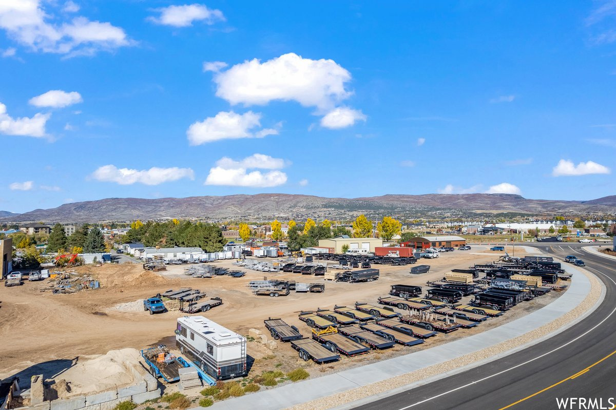 PRIME COMMERCIAL PROPERTY IN THE BEAUTIFUL HEBER VALLEY!! 2.241 ACRES ZONED C-2 IN A INCREASING DEVELOPED AREA OF THE VALLEY.  JUST OFF HWY 40 THIS COMMERCIAL LOT HAS GREAT VISIBILITY AND MANY DEVELOPMENT OPTIONS. Lot can be divided into small parcel sizes for other commercial options.  ALL UTILITIES TO THE LOT!!  VACANT LOT. Buyer to verify all information.  Acreage figures are provided as a courtesy estimate only.  Buyer is advised to obtain an independent measurement.