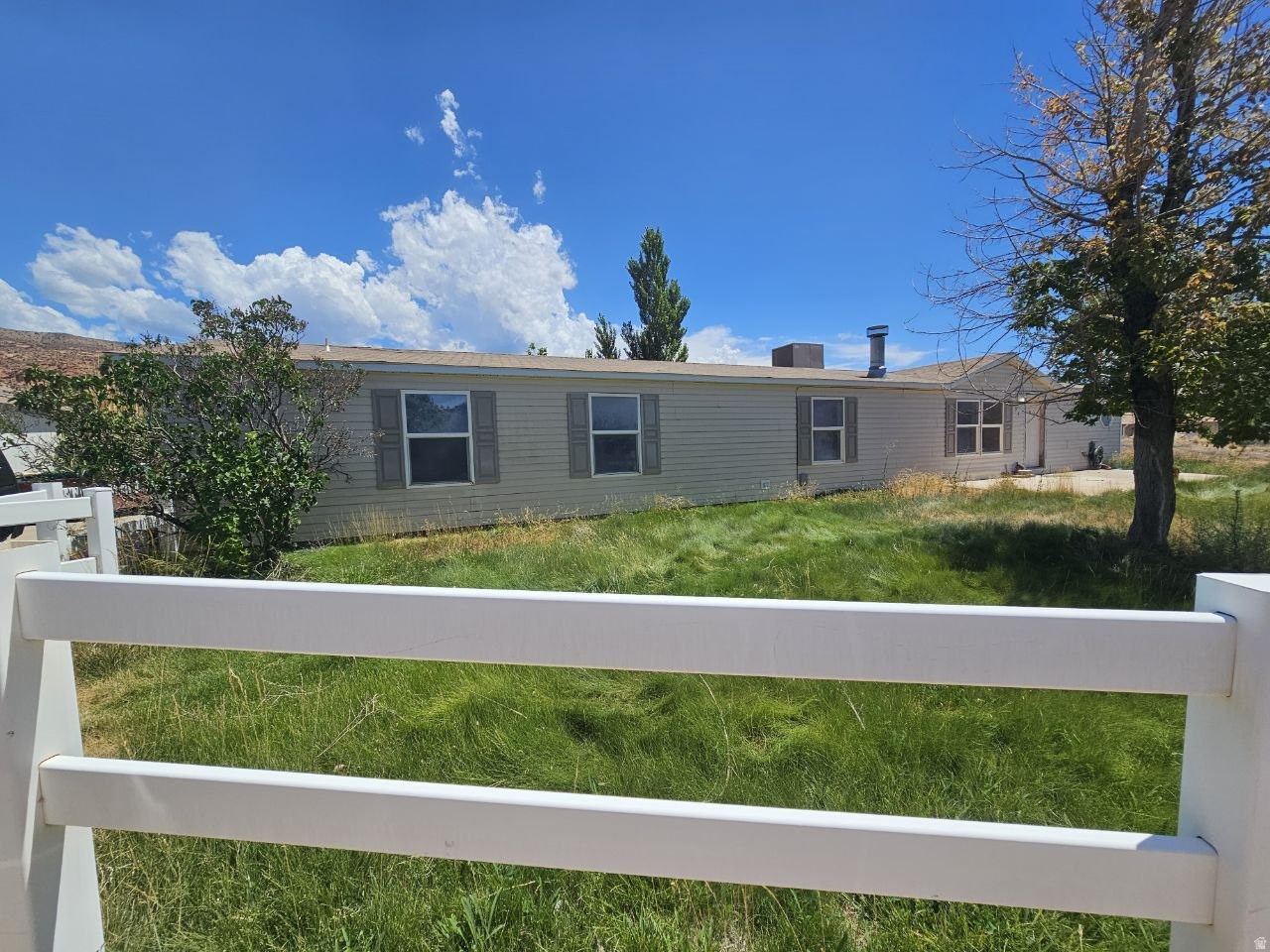 Welcome to 52 Quail Ct in Moab, Utah, a spacious 6-bedroom, 3-bathroom home with a versatile layout and plenty of room to make your own. Built in 2001, the property features generous living space, an attached garage, and included appliances such as the stove, refrigerator, microwave, washer, and dryer. With its size, location, and flexibility, this home offers a great opportunity for a wide range of buyers.