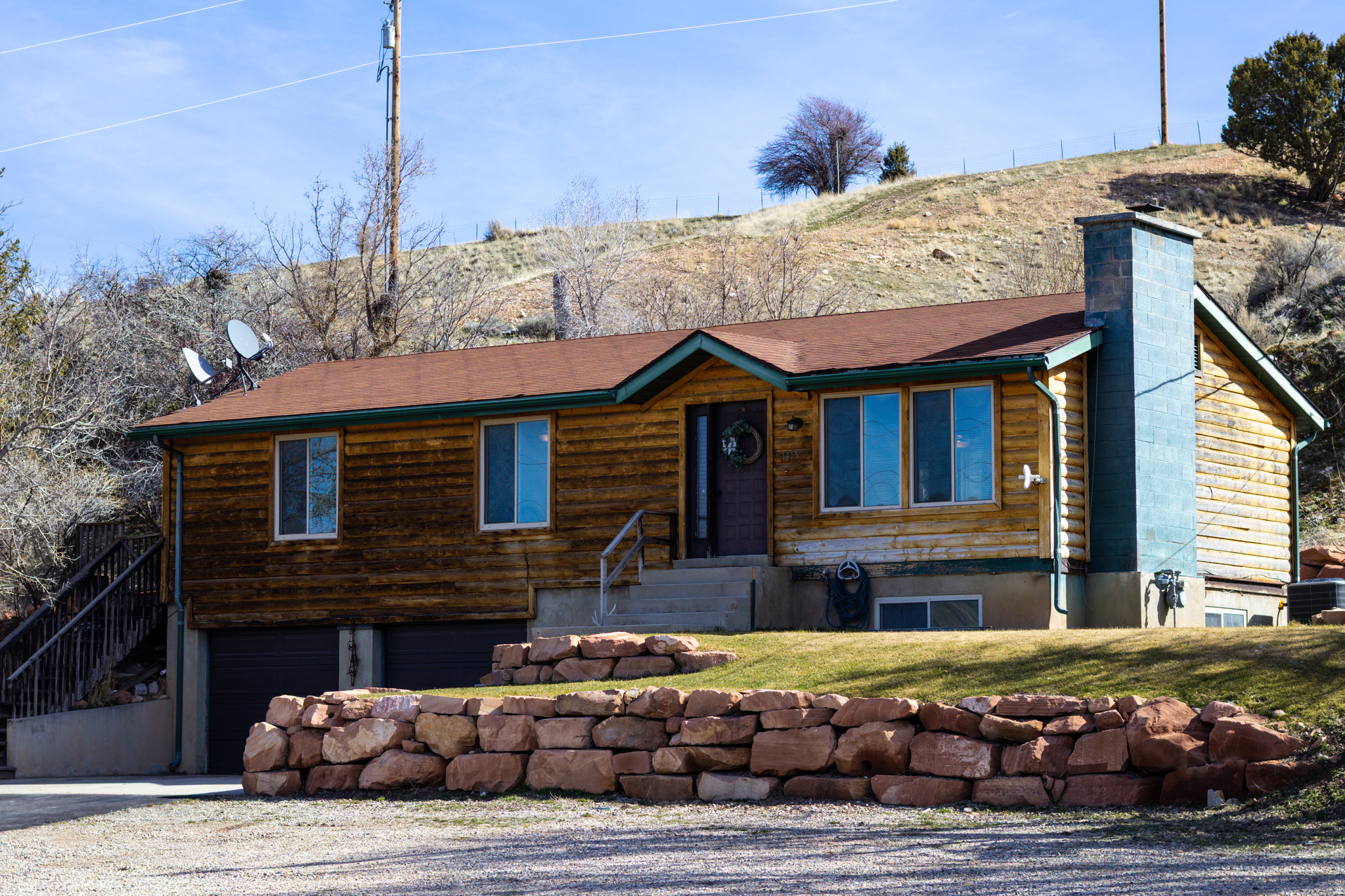 Beautifully renovated home on a full acre in Hoytsville, just outside of Coalville and 10 miles from Park City. This 3-bedroom, 2-bath property features an updated interior with new appliances, modern finishes, and a bright, functional layout. The main level includes a living area, kitchen, dining space, 3 bedrooms that include a primary suite with ensuite bath and private access to the back patio.  The fully finished basement offers a second living area with fireplace and flexible space for an office, gym, or additional living needs, along with ample storage. 2 car garage attached.  Enjoy a grassy yard, garden area, and open space with room for horses and future improvements. Perfect for those seeking quiet country living with easy access to Park City amenities.