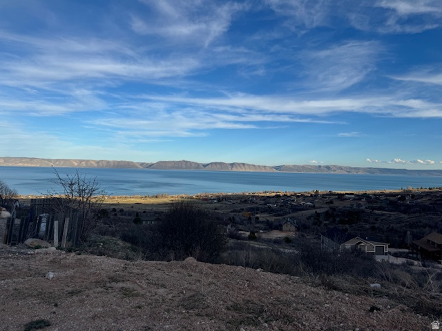 Discover the perfect place to build your dream home or vacation retreat.  This lot is located in Bear Lake West.  This .28 acre lot is situated in a quiet cul-de-sac, offering tranquility and stunning natural surroundings.  Enjoy the panoramic views of Bear Lake-often called the Caribbean of the Rockies thanks to its brilliant turquoise-blue waters.  Bear Lake amenities are top notch, which includes a Golf Course, Clubhouse, Swimming Pool, a fine dining restaurant and Pickleball Courts. Just minutes away from the Idaho North Beach.  Short term rentals are not allowed.