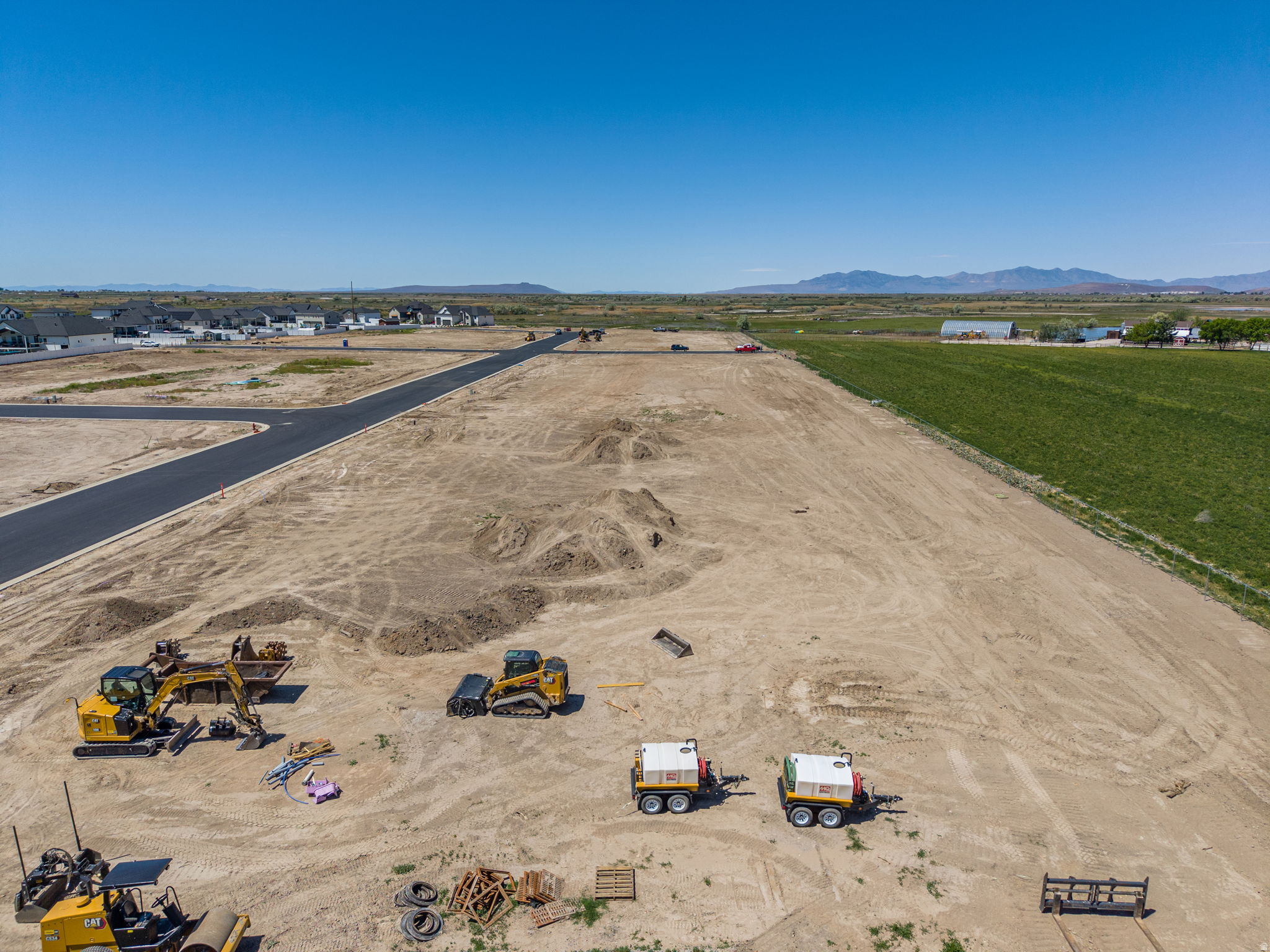 Lot 224 in Rawson Ranch is South facing in a 28-lot subdivision in the peaceful countryside of Hooper, Utah, offering large, near half-acre building sites that are hard to find these days! These lots have stunning mountain views and ample space for a comfortable family home, barn, or shop, all without an HOA. You can choose your own builder, or we can happily recommend several reputable options. There are multiple lots currently for sale, please contact the listing agent to confirm which ones are available. If you value flexibility, space, and a serene rural setting within easy reach of amenities, Rawson Ranch is a great option! Reach out to discuss available lots, and start planning your custom home! Be sure to check out the video tour!