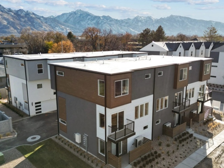 Towns at 45th & 5th. This quality built home features quartz countertops, custom soft close cabinetry, open concept kitchen/great room, 9 ft ceilings, tankless water heater & a huge 2 car garage. Enjoy modern living just minutes from dining, shopping, skiing, hiking & downtown SLC. Top that off with access to the community pool, clubhouse, gym, BBQ, fire-pit, playground, picnic area and more. All this in a central and convenient location. Other units available!. Ask about the amazing financing option that allows for 3% DOWN PAYMENT WITH NO MORTGAGE INSURANCE, a 2-1 buy-down, plus $12,500 buyer incentives toward closing cost, additional rate buy downs, and or appliances.  **Photos are of previous model**. ( Buyer to verify all information and square footage. ) Unit is currently at drywall and paint. To be completed by September 2026.