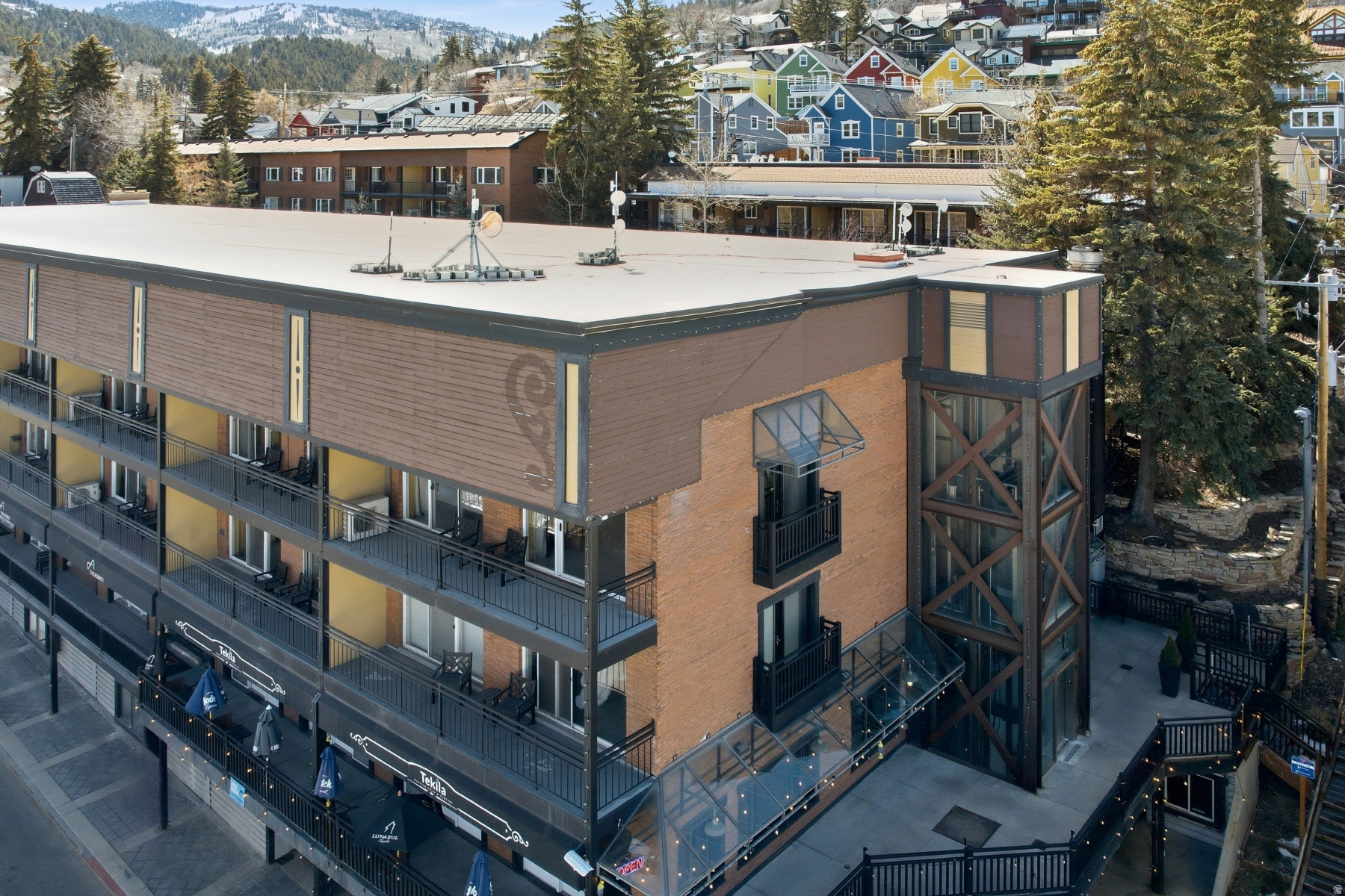 Perfectly positioned in one of the most desirable locations at Treasure Mountain Inn, this corner 1-bedroom, 1-bathroom condominium overlooking Main Street offers a rare blend of privacy, views, and authentic Park City history. This very location once hosted CNN's Sundance celebrity lounge and broadcast coverage during the Winter Olympic Games, placing the residence at the center of some of Park City's most iconic moments.  With windows on multiple sides, the open-concept living space is bright and inviting and enjoys one of the best vantage points of historic Main Street. The living area's Juliet balcony provides a front-row perspective of the energy and charm of Old Town, while the corner orientation adds both privacy and natural light.  Located just steps from the elevator with direct access to Main Street, you are moments from Park City's renowned restaurants, galleries, shopping, and nightlife. The residence also features a separate bedroom for a quiet retreat and a private courtyard patio.  Offered fully furnished, the home is ready for immediate enjoyment as a mountain getaway or income-producing rental. Treasure Mountain Inn amenities include secure underground parking, a year-round hot tub, fitness center, and on-site spa and dining. With Deer Valley and Park City Mountain Resort just minutes away and Salt Lake City International Airport within easy reach, this corner residence offers an exceptional Old Town lifestyle.