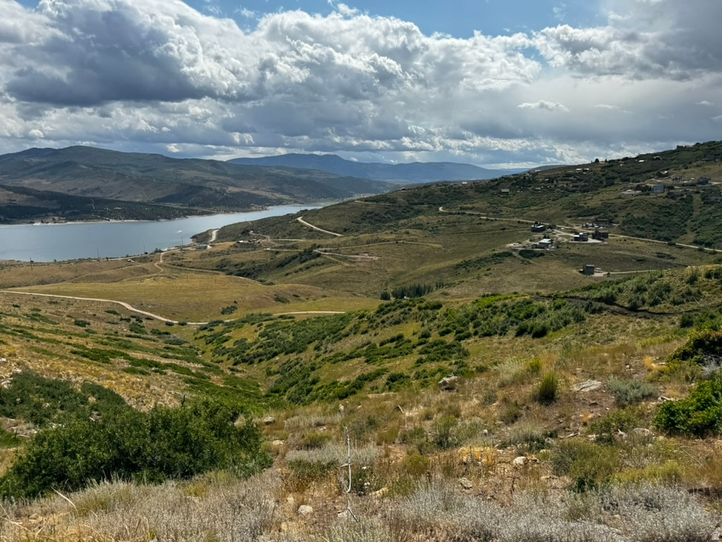 Price Reduced! Get out of the city congestion and smog and enjoy the great outdoors on this 20.05 acre view lot. Views in the distance Deer Valley and Promontory next door! Located in a gated community for total privacy. Electrical service is on the lot below, Zoning allows one cabin with no size restrictions and 1 ADU up to 1000 sq ft of livable space. Also allows multiple sheds, outbuildings etc.   Water rights secured with Weber Basin District. Buildable pad approx. 10.07 buildable acres. Many flat pieces to build on. This is an upper lot with amazing views of Park City, Rockport Reservoir, Uintah Mountains. Within minutes of Rockport State Park for fishing, boating or paddle boarding. Bring your camper, water toys and ATV's and enjoy the wonders of nature. Only 45 minutes from Salt Lake and 20 minutes to Park City for shopping, dining, entertainment, skiing and golf. Seller has paid the fee to protect water rights. SHOW ANYTIME. GPS 4046'26"N 11125'38"W. Buyer to verify all information including access to utilities.