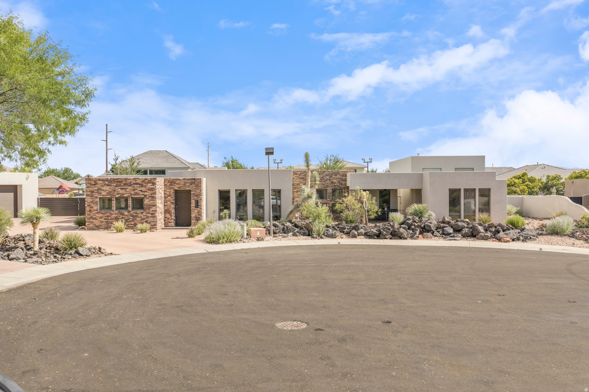 Incredible home in the sought-after Lava Cove at Entrada on a private .42-acre cul-de-sac lot with stunning Red Mountain View's. Recent improvements include a brand-new roof, fresh exterior paint, and a newly finished theater room / entertaining space in the detached garage. Inside, enjoy an open-concept floor plan, sunken living room, gourmet kitchen with Thermador appliances, luxurious primary suite, private casita with kitchenette, and detached office. The backyard is designed for entertaining with a covered spool/hot tub, mature landscaping, and multiple outdoor living spaces. Enjoy resort-style living with access to Entrada's premier amenities, including pools, fitness center, pickleball, tennis, walking trails, and more. Reach out with any questions and schedule a private showing today!