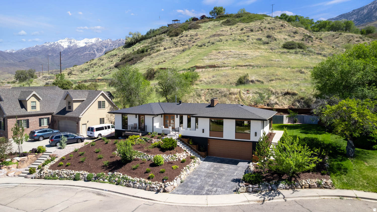 Welcome to this beautifully renovated home, with a mother-in-law apartment! This home has no backyard neighbors, privacy, valley and lake views galore, even from the basement window! And the garage? Massive! You can fit 2 Suburbans and have tons of room for your gear! The kitchen is to die for! With an extra-large gas stove, a wall oven, a 48" Sub-Zero fridge, and a butler's pantry?! This home was built for entertaining, with its large dining area, large living room, a theater area, and game room. This house is meant to have family and friends over. Did I mention the renovation included all new plumbing, electrical, roofing, etc? The home is brand new inside and out! Come make this your home, and explore all it has to offer. Within 15 minutes, you have anything you could want, from hiking trails, mountain biking, top-notch restaurants, and friendly neighbors.