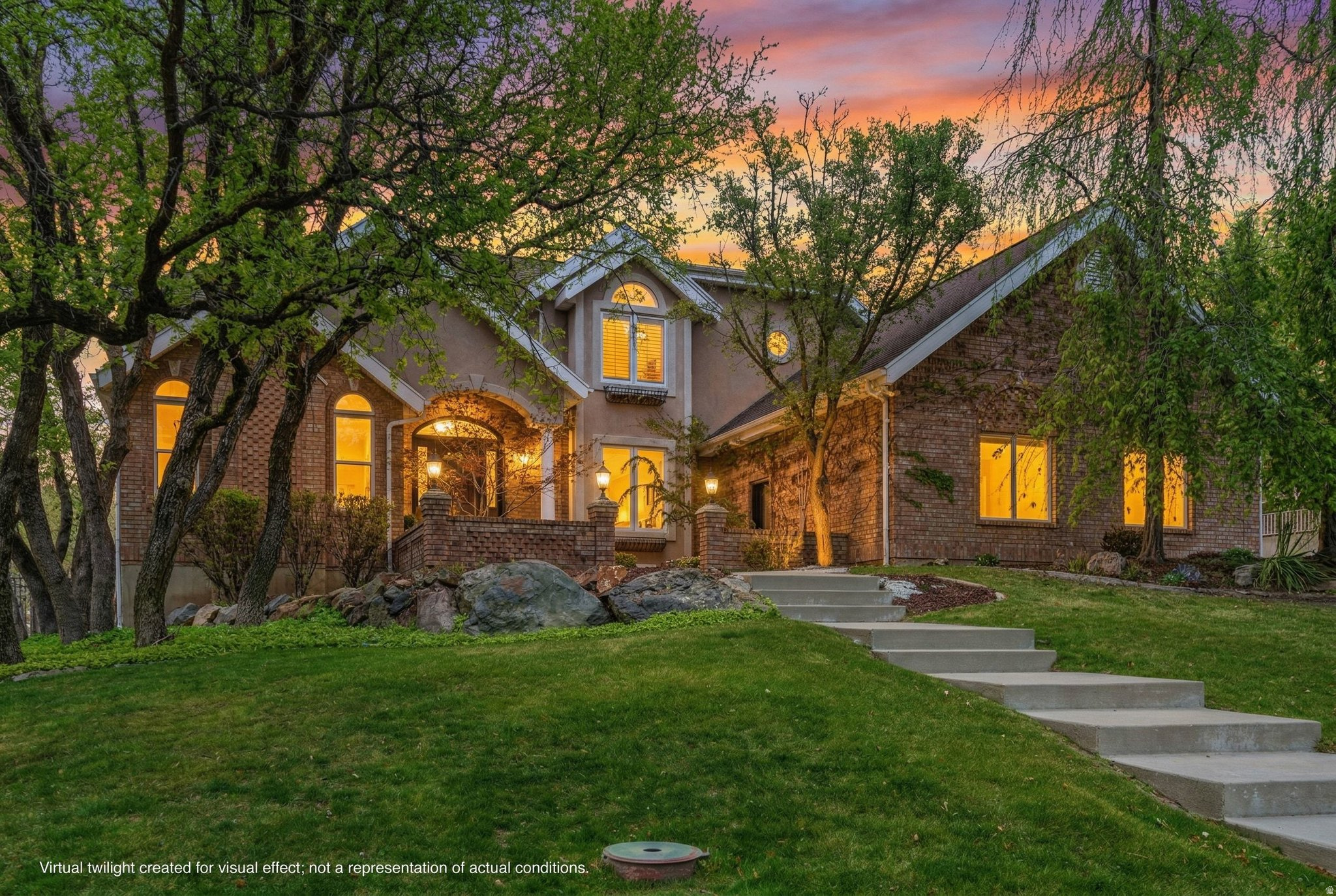 Incredible 6-bedroom, 5-bathroom custom family home with 5 fireplaces, located on a tree-lined street in Alpine's established east bench neighborhood. Bike and hiking trails connect directly to Lambert Park, and Creekside Park is just a short walk away.  The backyard feels like a private park. A covered patio with ceiling fans overlooks a beautifully landscaped yard with mountain views, mature trees, an in-ground trampoline, full basketball court with Dominator adjustable standards, and a play set. The saltwater pool features a tanning shelf, basketball hoop, motorized cover, and UV filter for easy maintenance and all-day enjoyment.  The recently remodeled main floor offers a stunning kitchen, ample pantry space, laundry room, and office area. Brand-new light oak hardwood floors create a bright, open flow throughout.  Upstairs includes 4 spacious bedrooms, highlighted by a primary suite with fireplace, sitting area, two walk-in closets, and a bathroom with dual vanities, jetted tub, separate shower, and private WC.  The basement includes 2 bedrooms, 2 bathrooms, a living area, reading nook, and rec room. It is plumbed and wired for a future kitchen and features a separate entrance from the garage-ideal for a mother-in-law apartment or independent living space.  The oversized attached garage fits 3 vehicles comfortably and includes built-in cabinets and Rubbermaid hook rail storage throughout. An auxiliary garage opens to both the driveway and backyard, offering additional space for toys and gear.